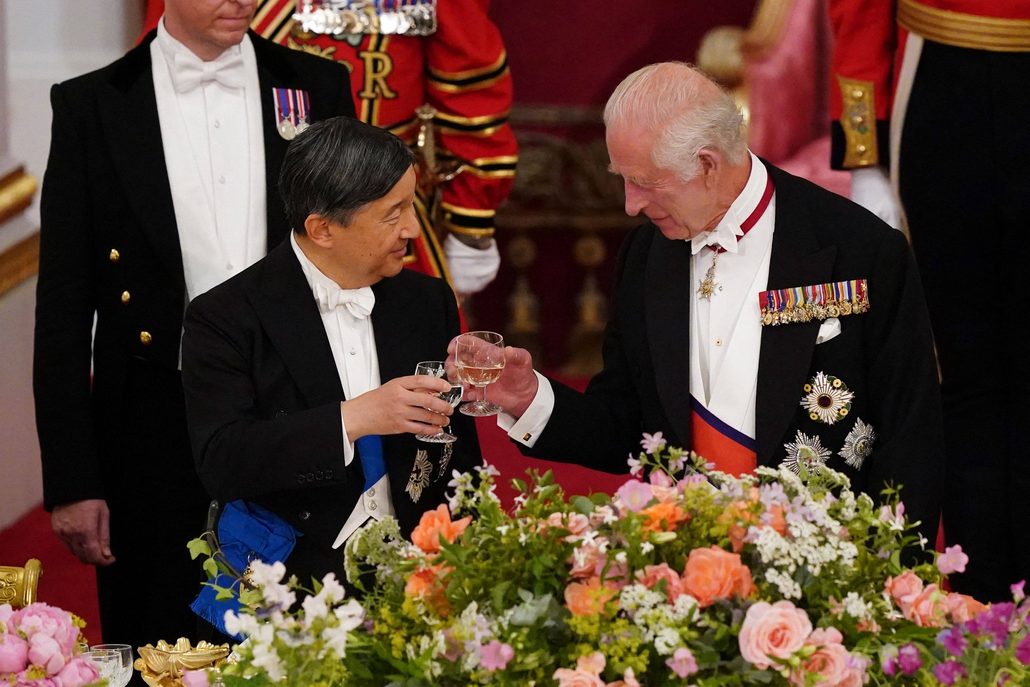 Britain’s King Charles and Japan’s Emperor Naruhito attend a State Banquet at Buckingham Palace in London on Tuesday. Photo: AFP