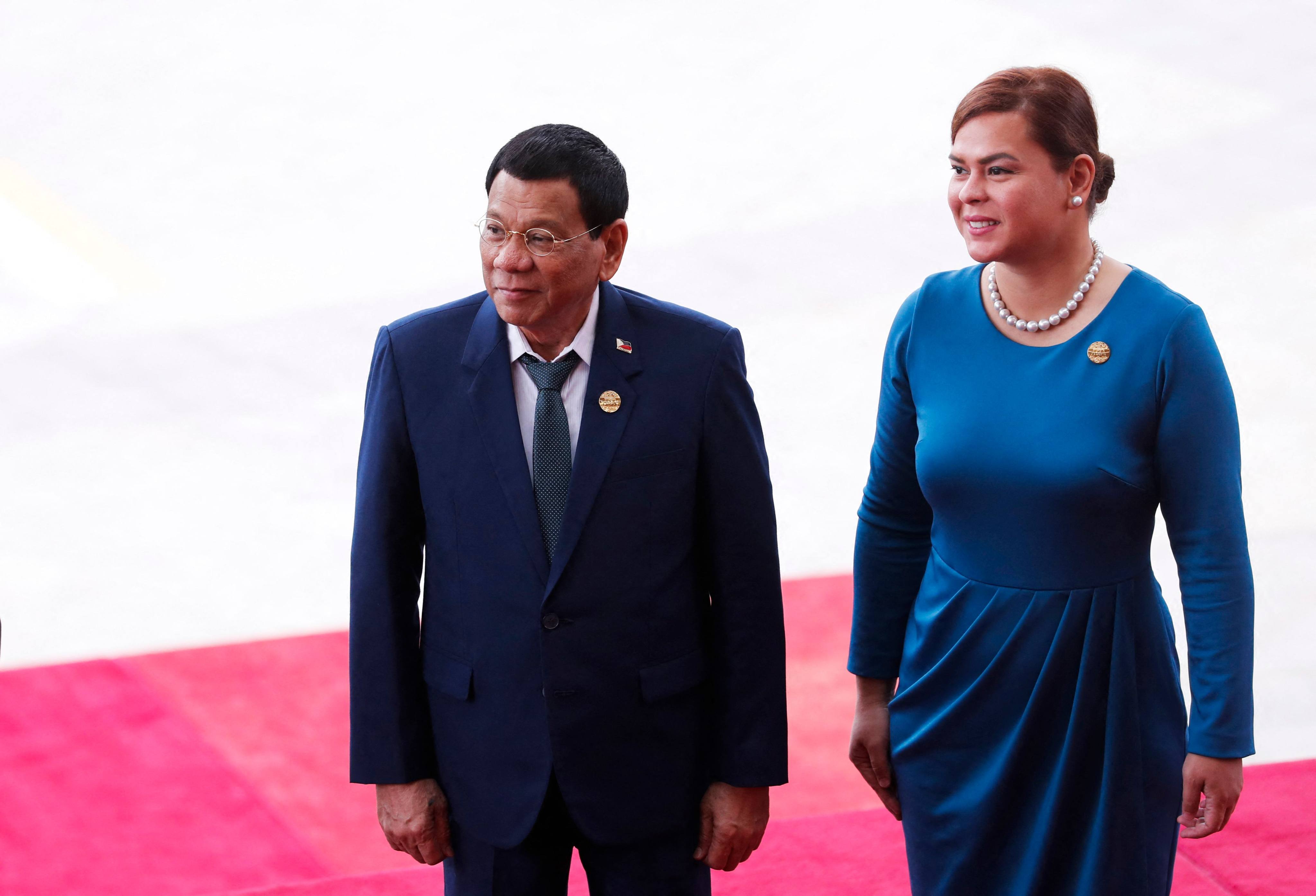 Philippine President Rodrigo Duterte (left) and his daughter Sara Duterte in 2018. Sara Duterte has confirmed her father and brothers are seeking Senate seats in the midterm elections next year. Photo: AFP