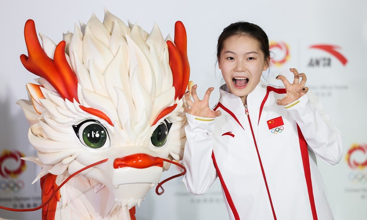 Trampoline athlete Hu Yicheng wears the Chinese medal ceremony uniform for Paris. Photo: Chinese Olympic Committee