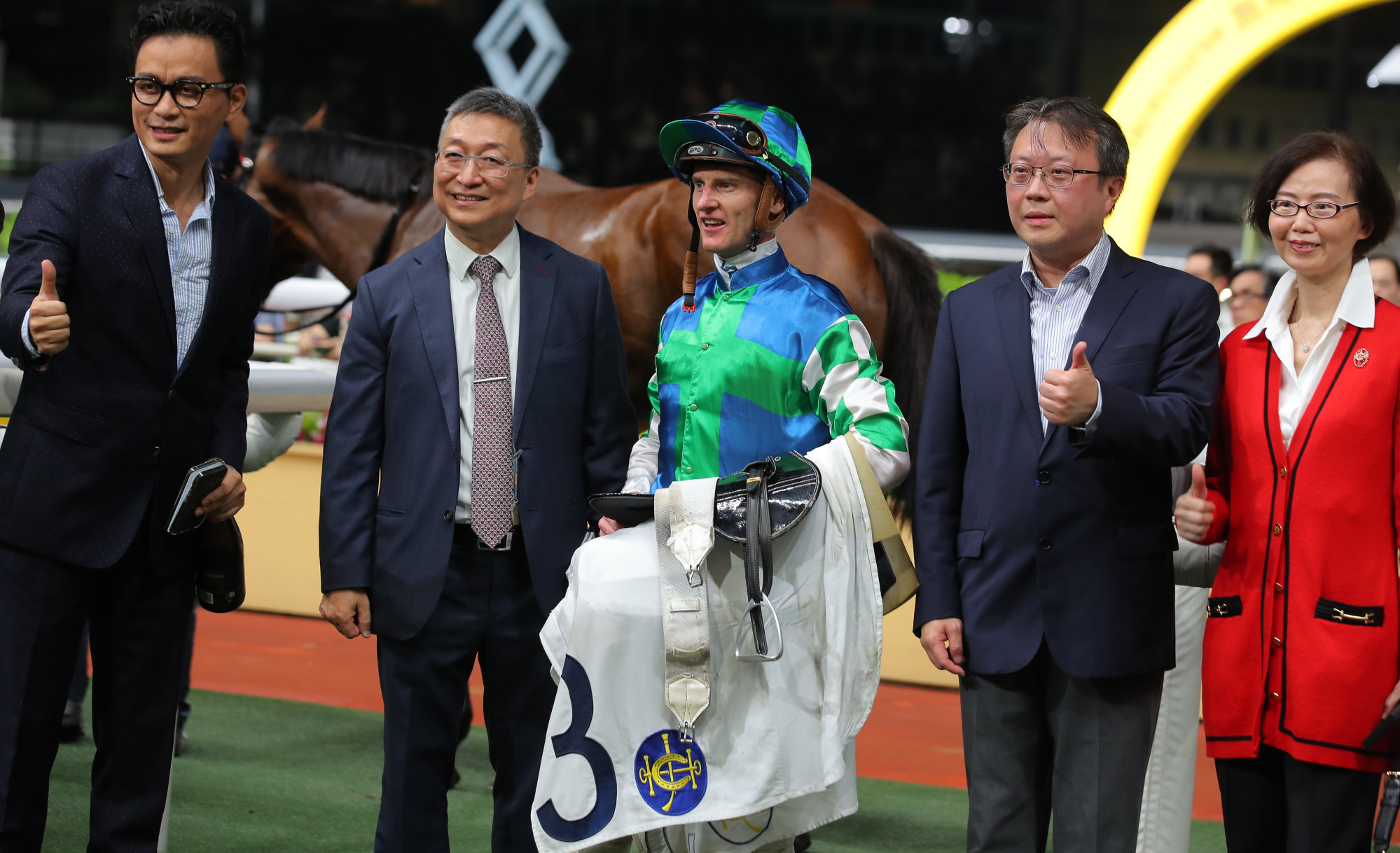 Trainer Francis Lui (second from left), jockey Zac Purton and connections celebrate Copartner Prance’s latest Happy Valley win.