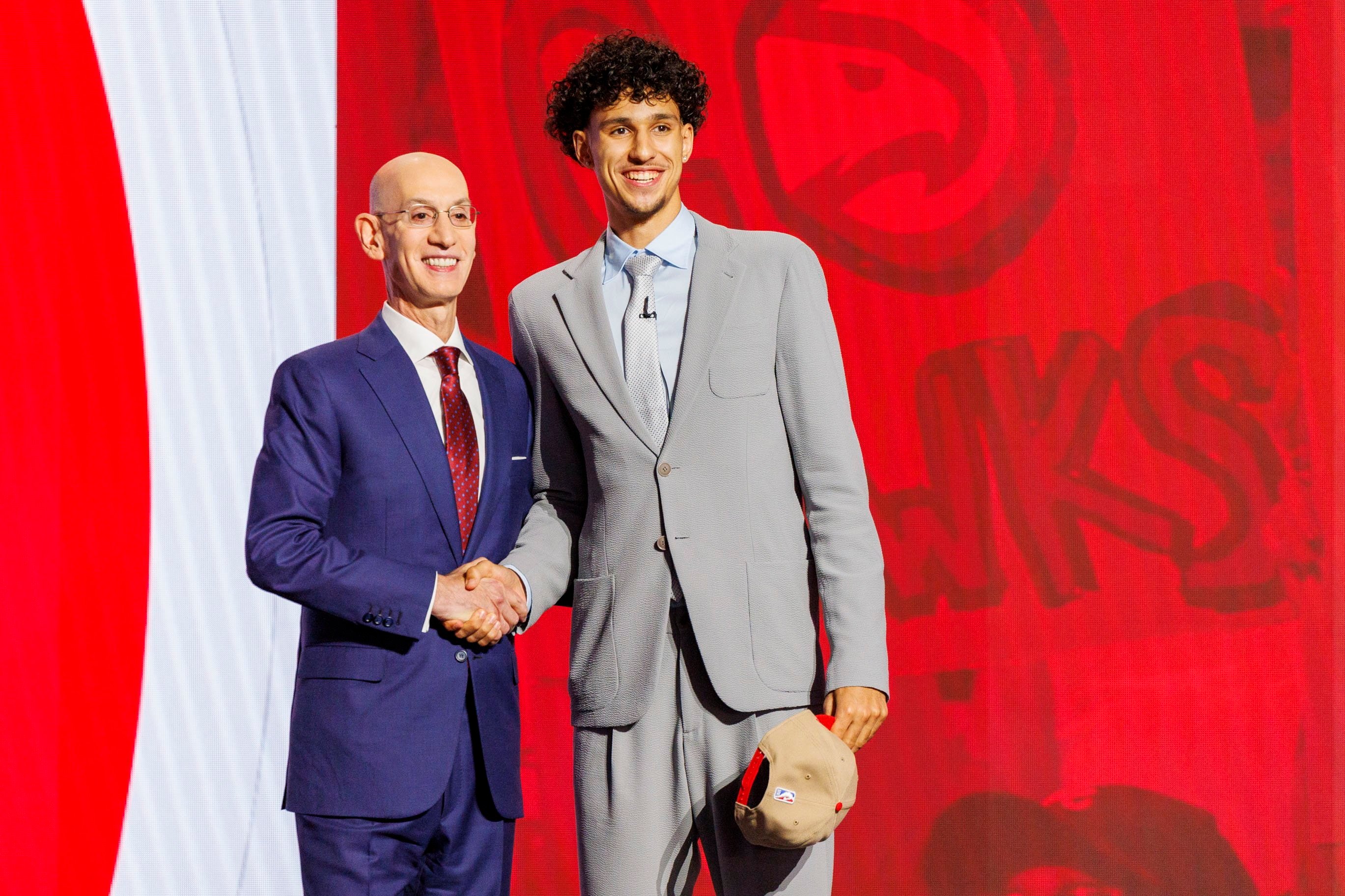 French player and No 1 pick Zaccharie Risacher (right) with NBA commissioner Adam Silver after being drafted by the Atlanta Hawks. Photo: EPA-EFE
