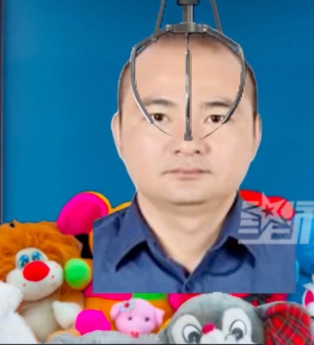 The animated claw grips the fugitive’s head as his mugshot sits on cuddly toys. Photo: Weibo