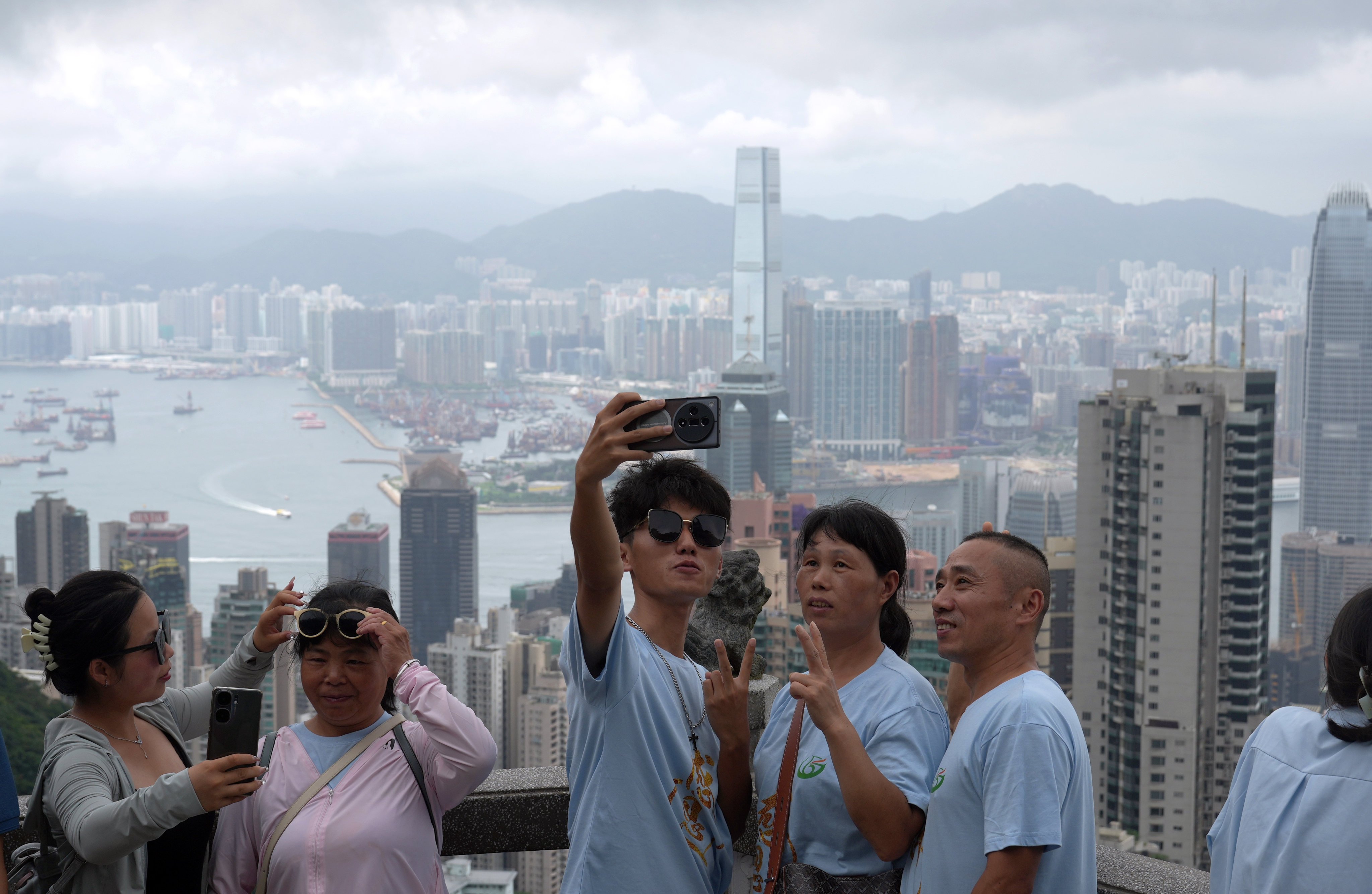 Mainland visitors currently need to pay a 13 to 15 per cent tax for purchases made in Hong Kong that exceed 5,000 yuan per trip. Photo: Sam Tsang