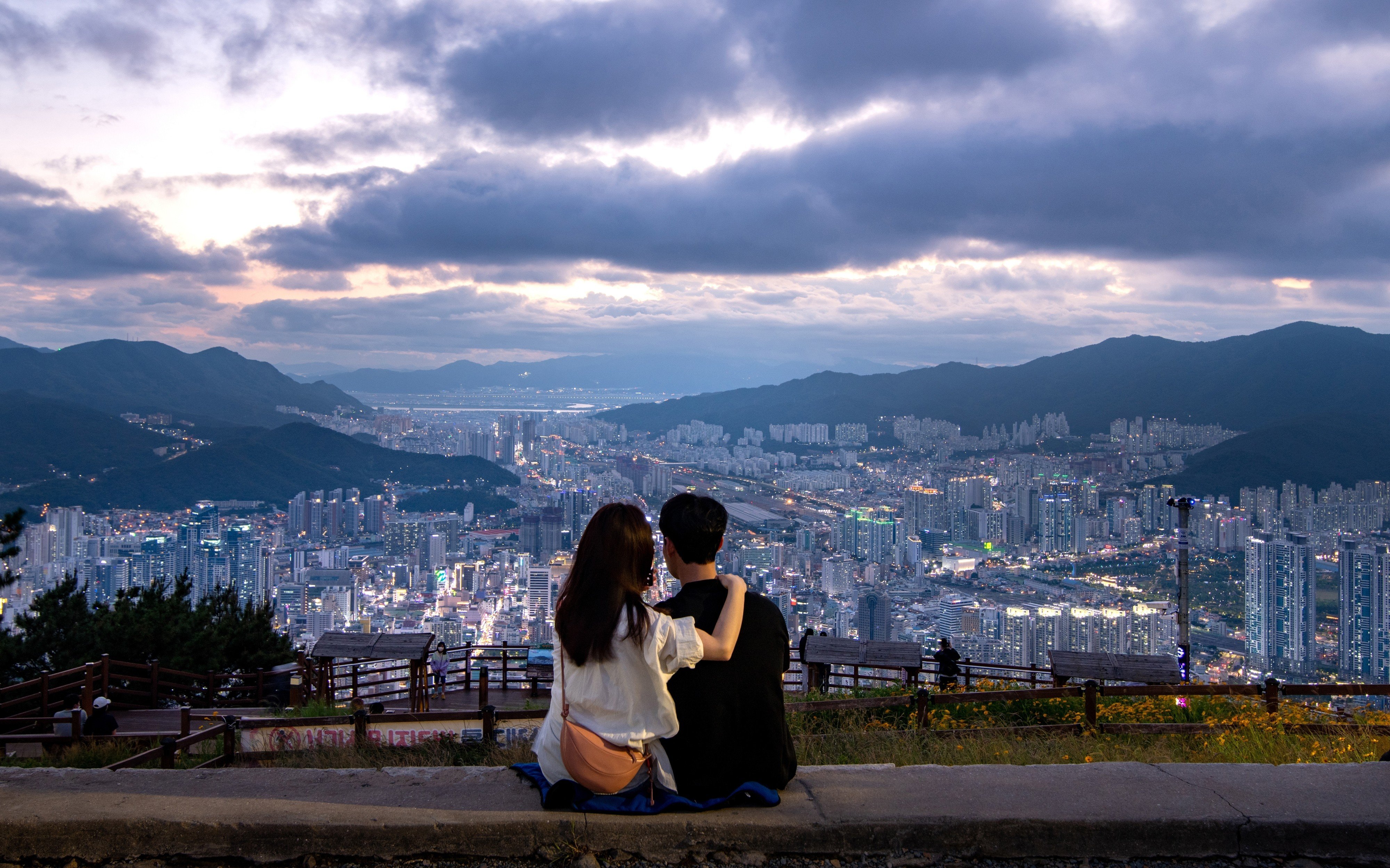 A couple watching the sunset in Busan, South Korea. Photo: Shutterstock