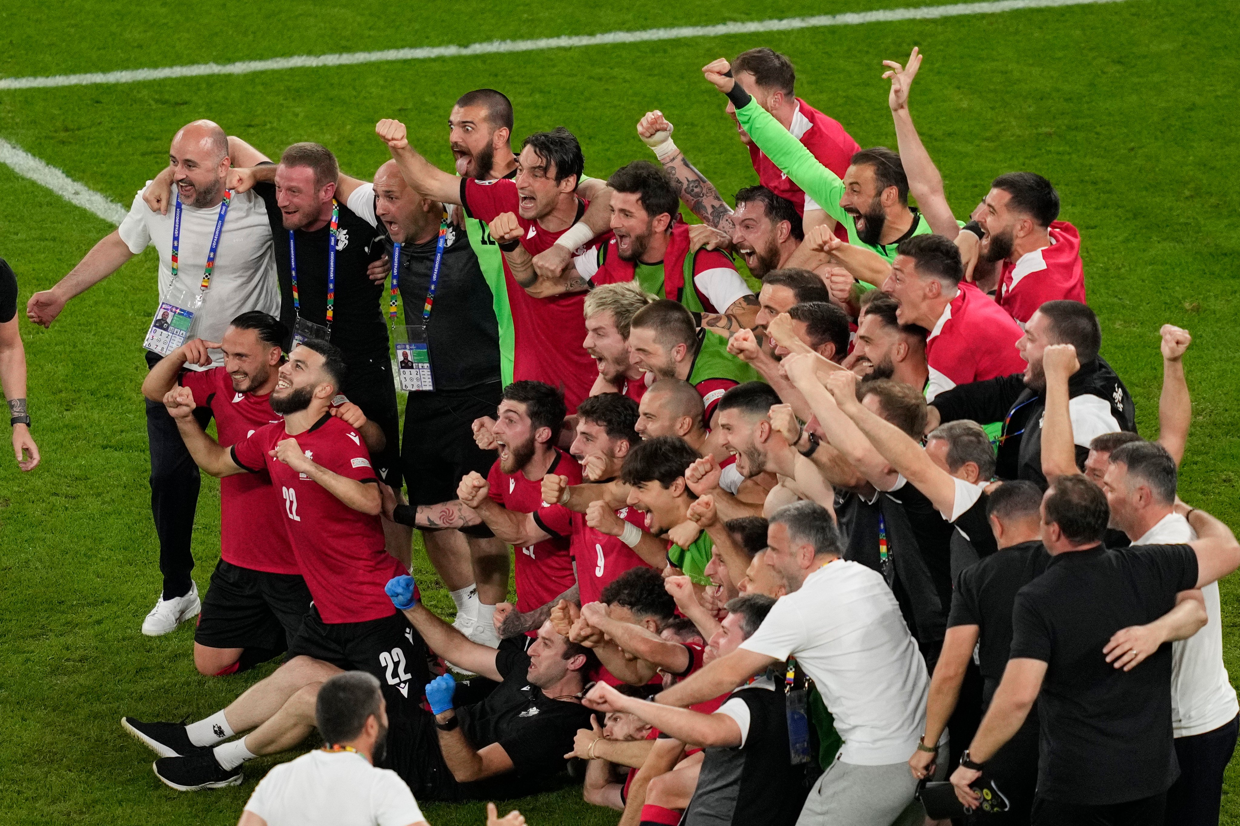 Georgia’s players celebrate after their historic win over Portugal to reach the Euros knock-out phase for the first time. Photo: AP