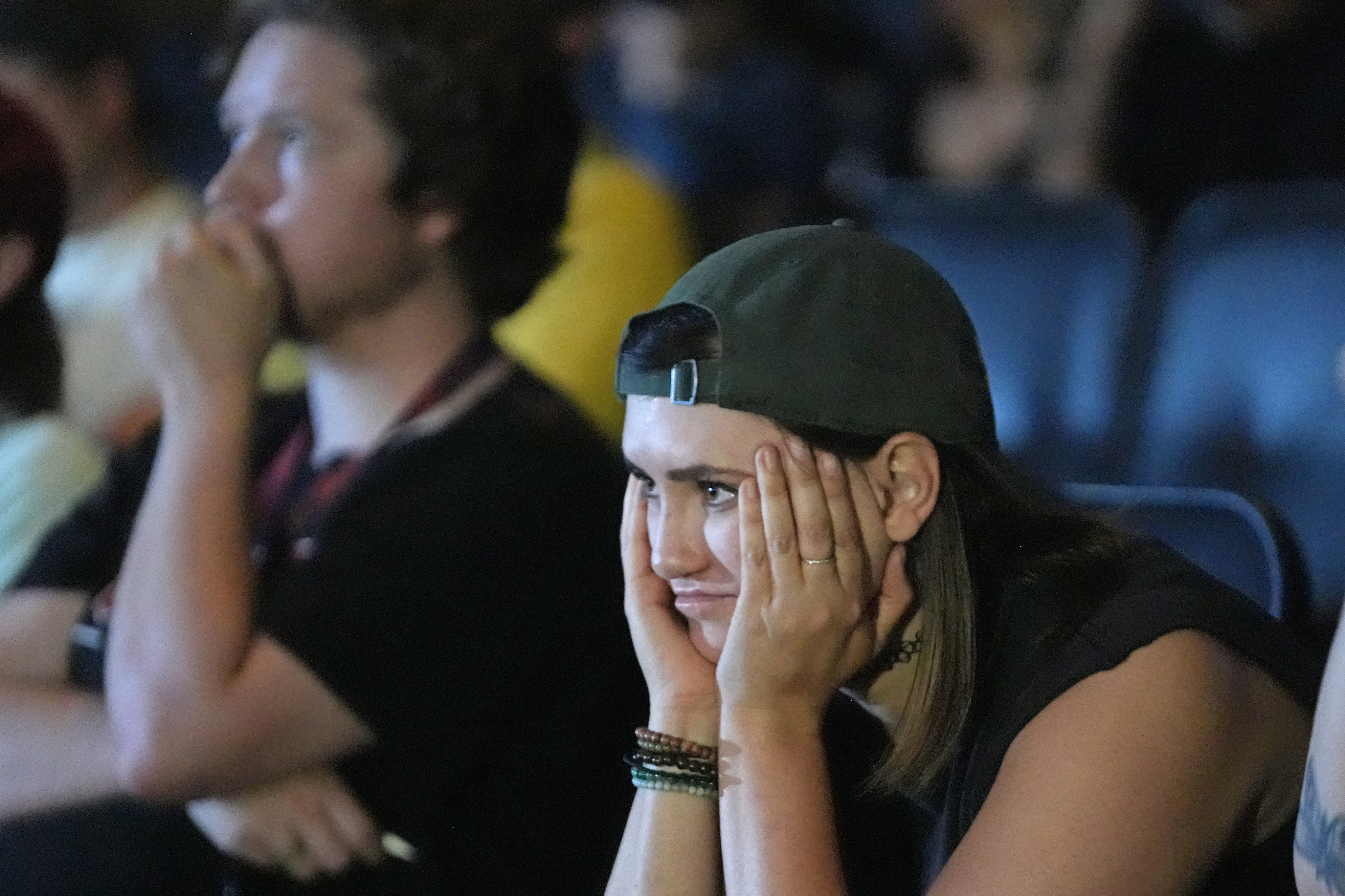 Sara Day, a supporter of President Joe Biden, watches coverage of the debate between Biden and former president Donald Trump in Utah. Photo: AP