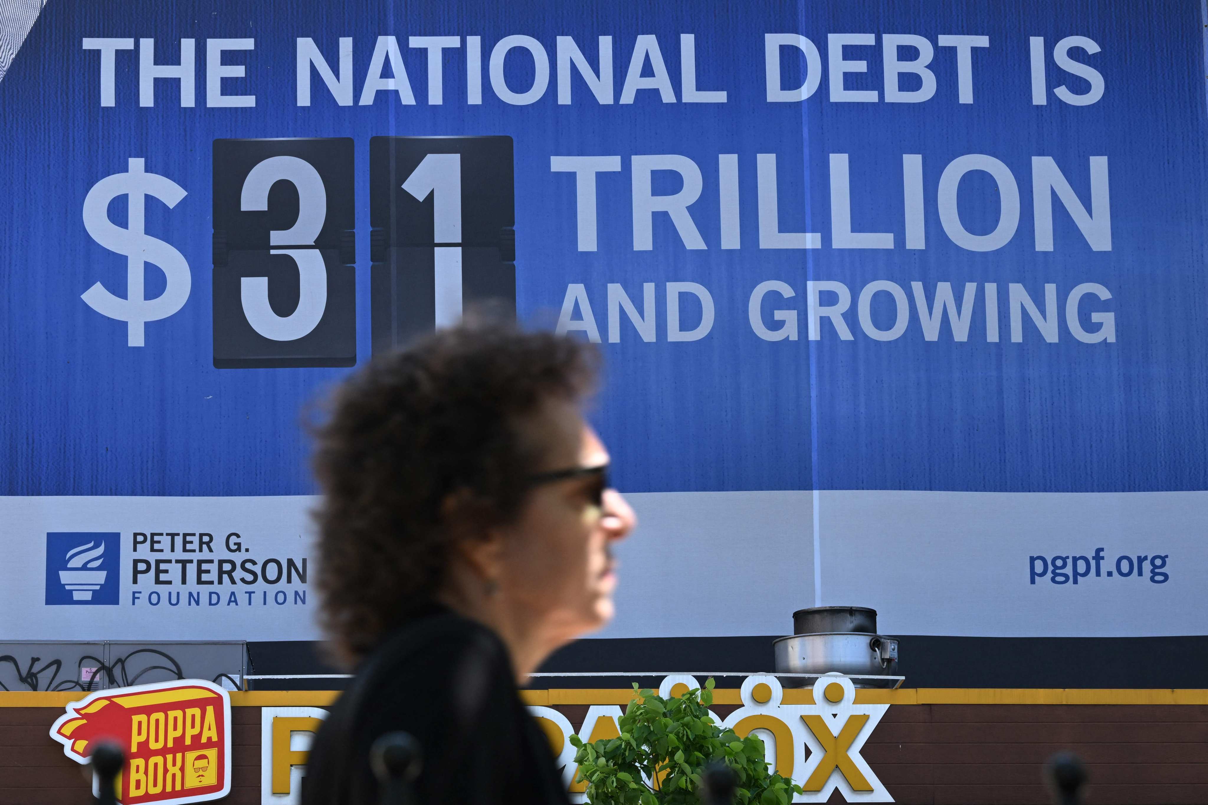 A billboard showing the debt limit is seen in Washington, DC on April 17 last year. If, as some scholars say, the US government can always finance its budget deficit, it must still ensure its fiscal and monetary policies serve its objectives. Photo: AFP