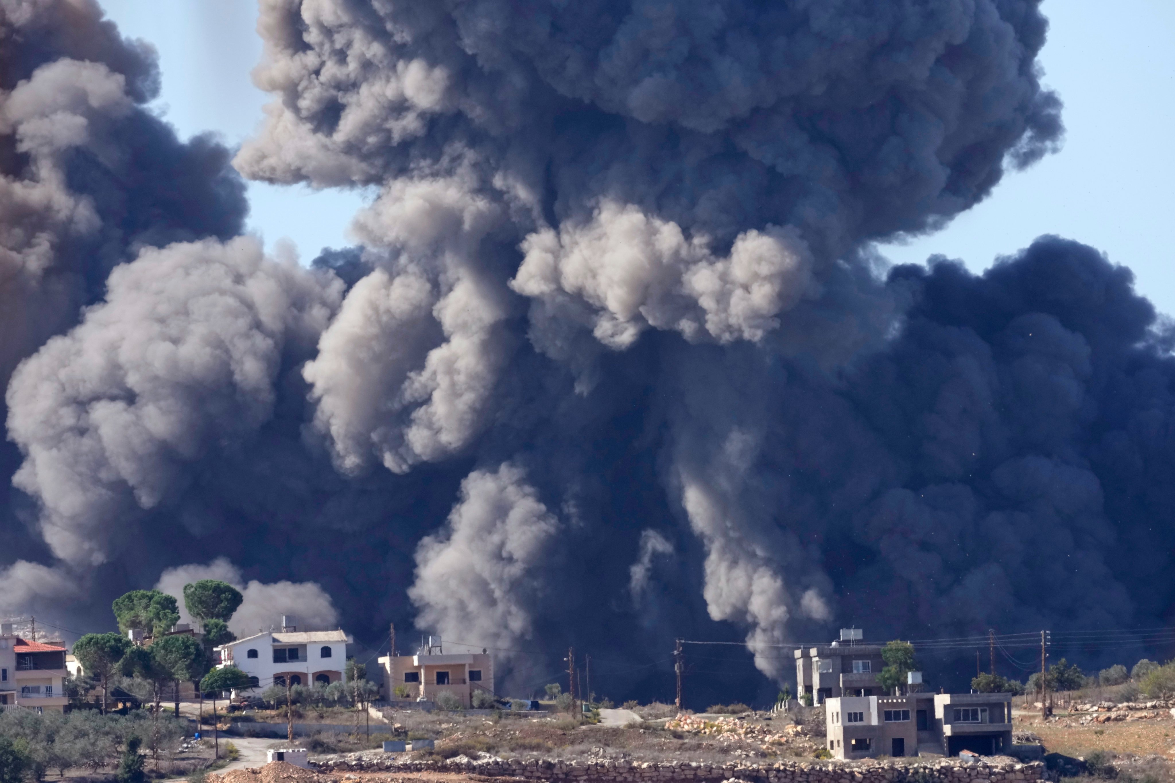 Black smoke rises from an Israeli air strike on the outskirts of Aita al-Shaab, a Lebanese border village in November, 2023. File photo: AP