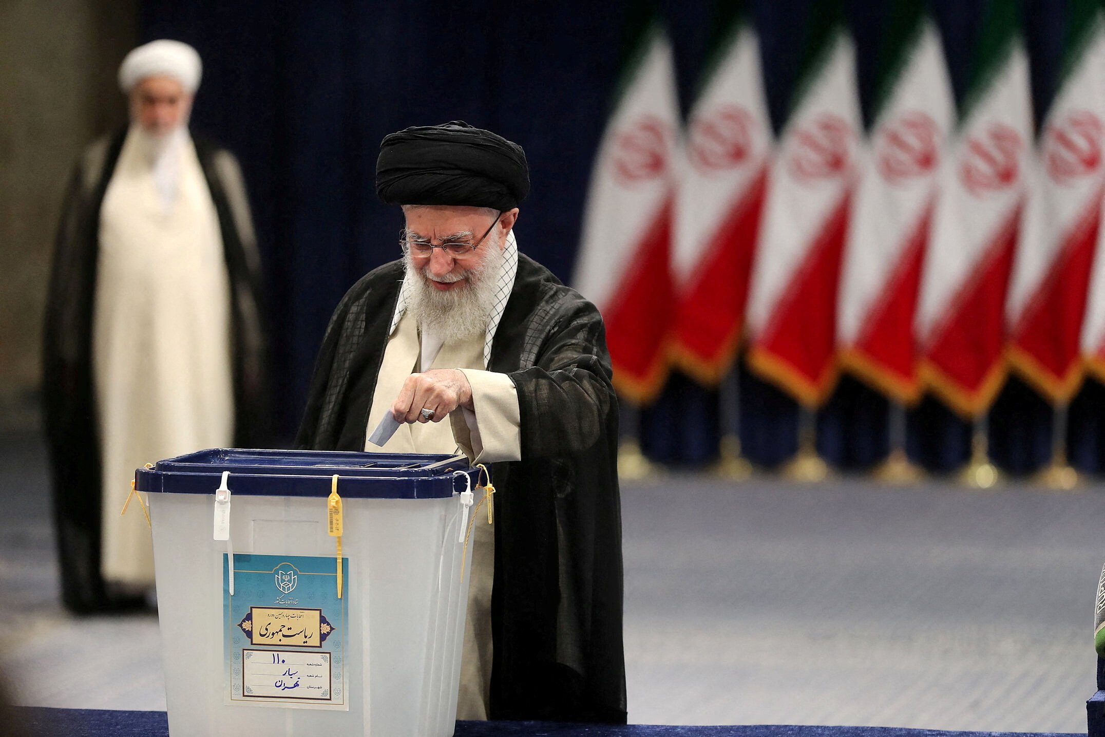 Iran’s Supreme Leader Ayatollah Ali Khamenei casting his vote. Photo: West Asia News Agency via Reuters