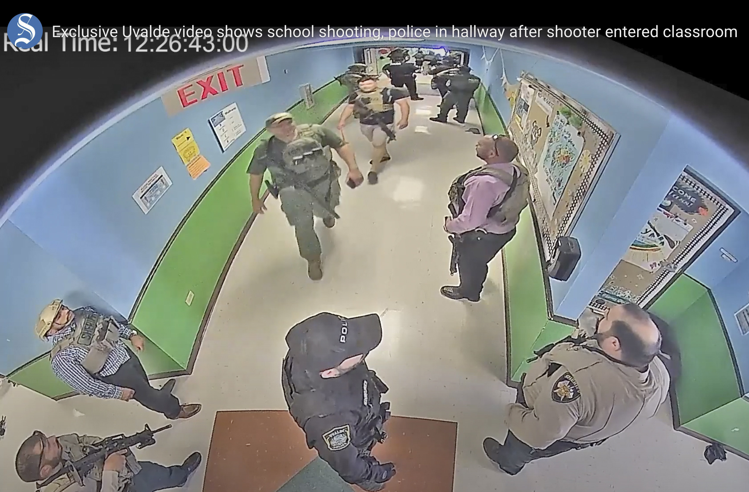 Police in in hallway at Robb Elementary School on May 24, 2022. File photo: Austin American-Statesman via AP