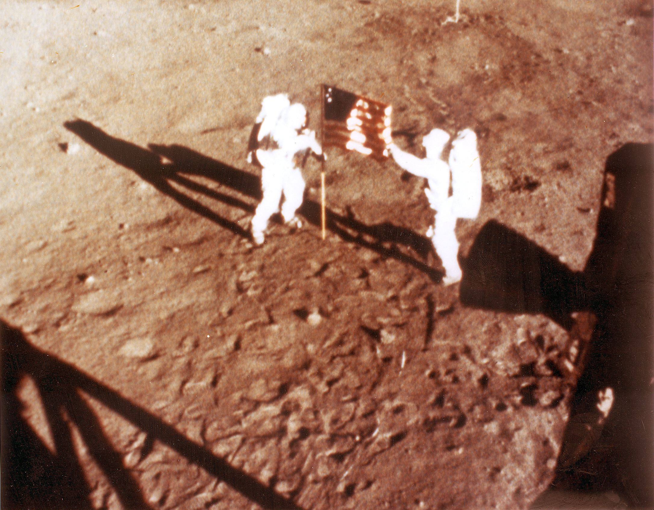 Neil Armstrong and Buzz Aldrin plant the US flag on the moon in 1969. The US is now in talks with China about how to protect it and other traces of the Apollo 11 mission. Photo: AFP