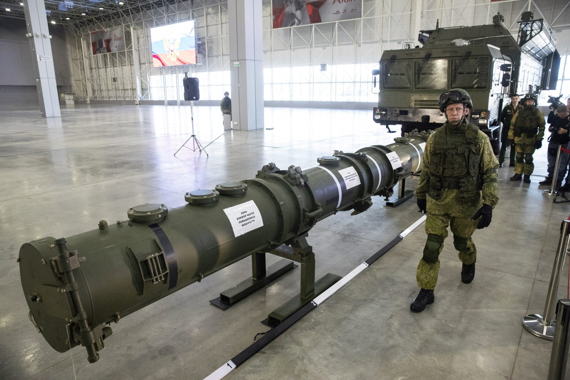 A Russian military officer walks past the 9M729 land-based cruise missile on display in Kubinka, outside Moscow, in January 2019. Photo: AP