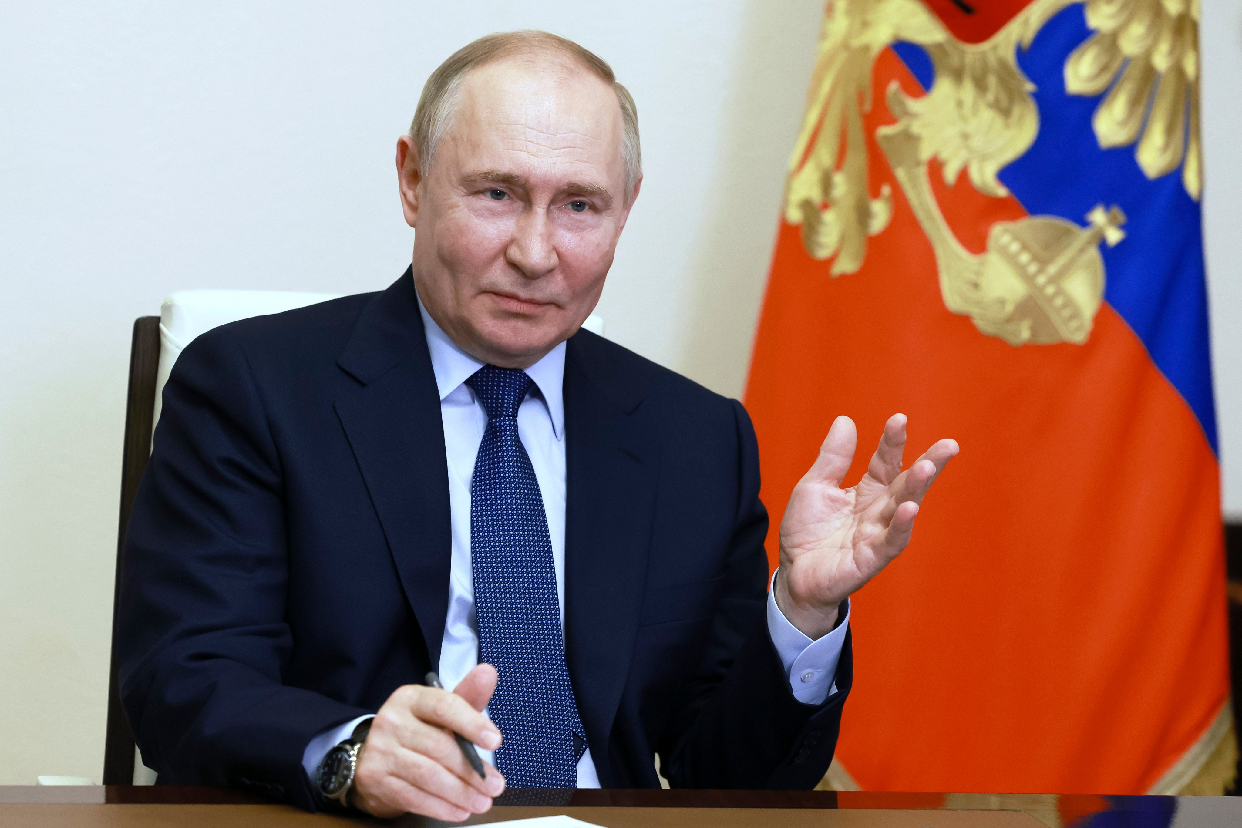 Russian President Vladimir Putin speaks in Moscow during a meeting with graduates of the Russian Presidential Academy of National Economy and Public Administration via videoconference on Friday. Photo: Sputnik via AP