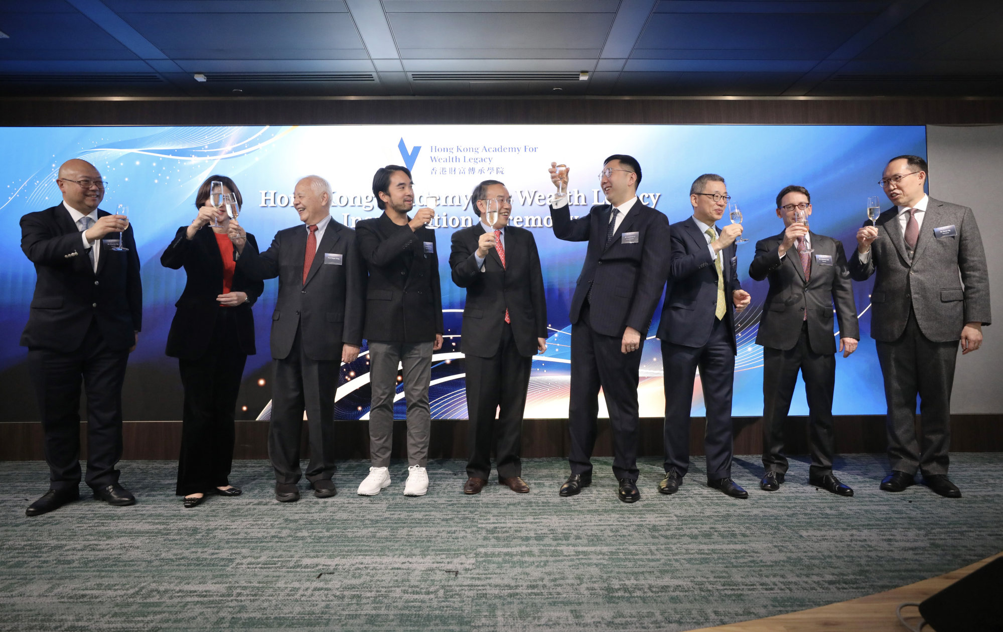 Adrian Cheng Chi-kong (fourth from left), chairman of the Hong Kong Academy For Wealth Legacy, and Secretary for Financial Services and the Treasury Christopher Hui Ching-yu (fifth from left), at the launch of the academy on November 14, 2023. Photo: Xiaomei Chen