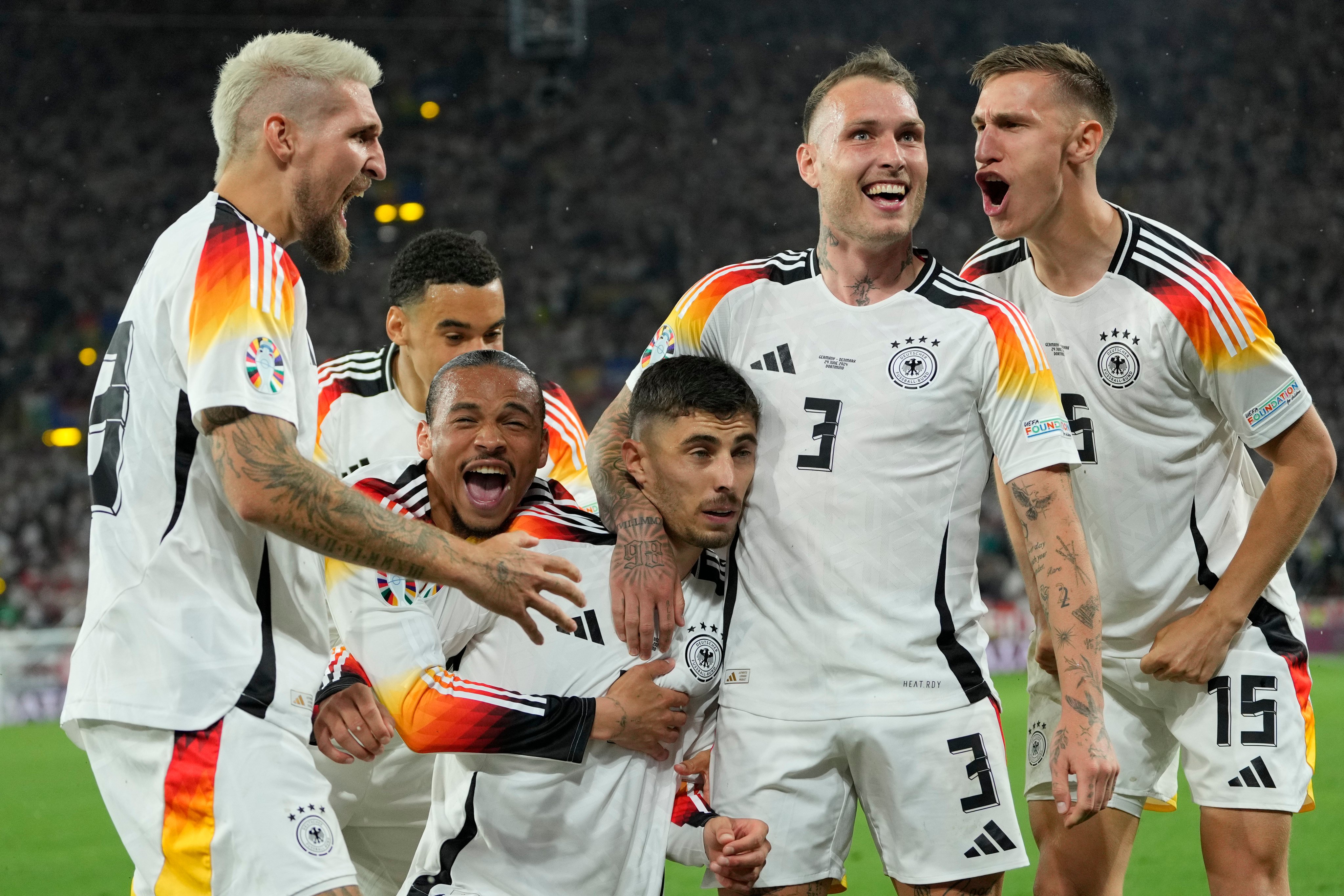 Germany’s players celebrate with Kai Havertz after he opened the scoring in their last-16 victory over Denmark. Photo: AP