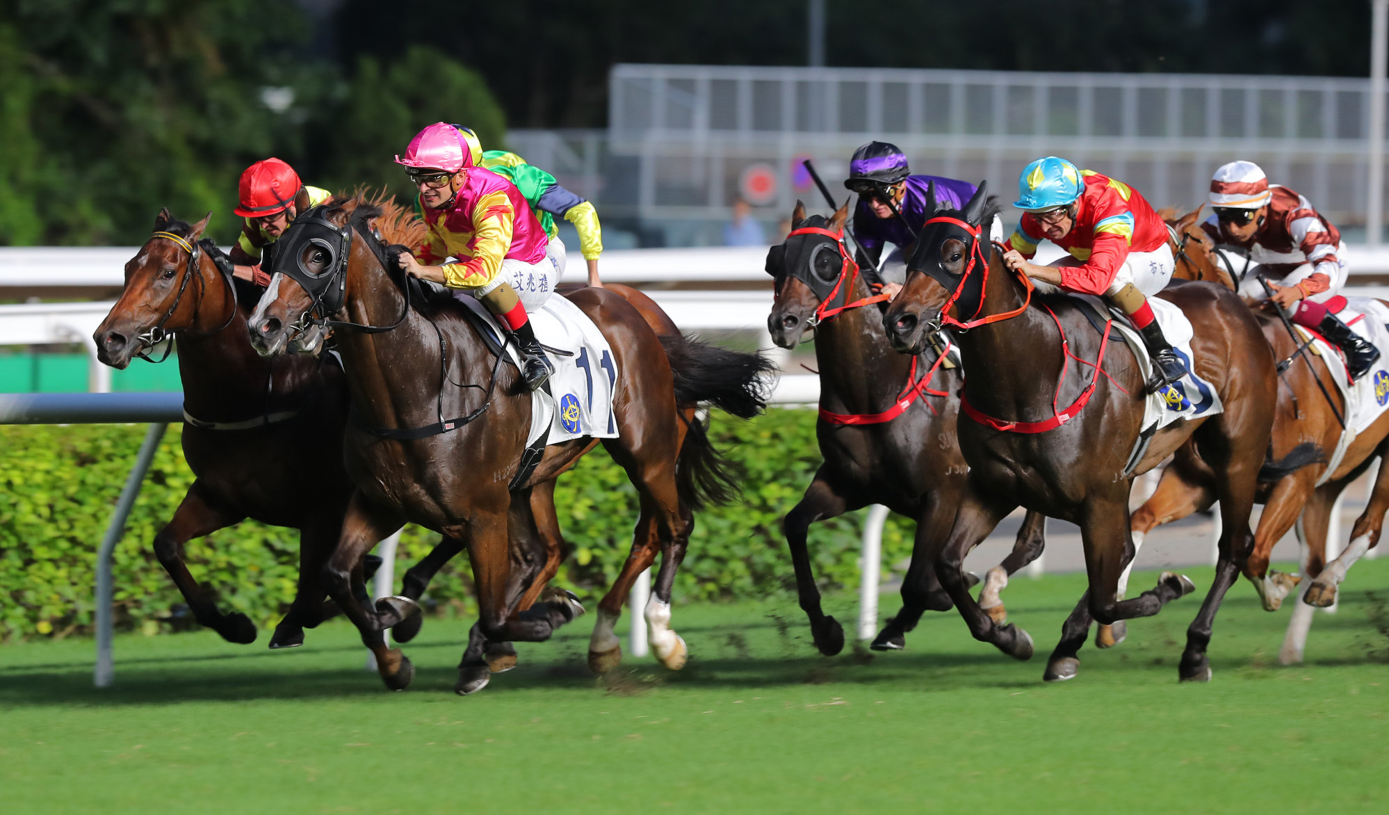 Super Bonus lifts under Andrea Atzeni to narrowly win at Sha Tin.