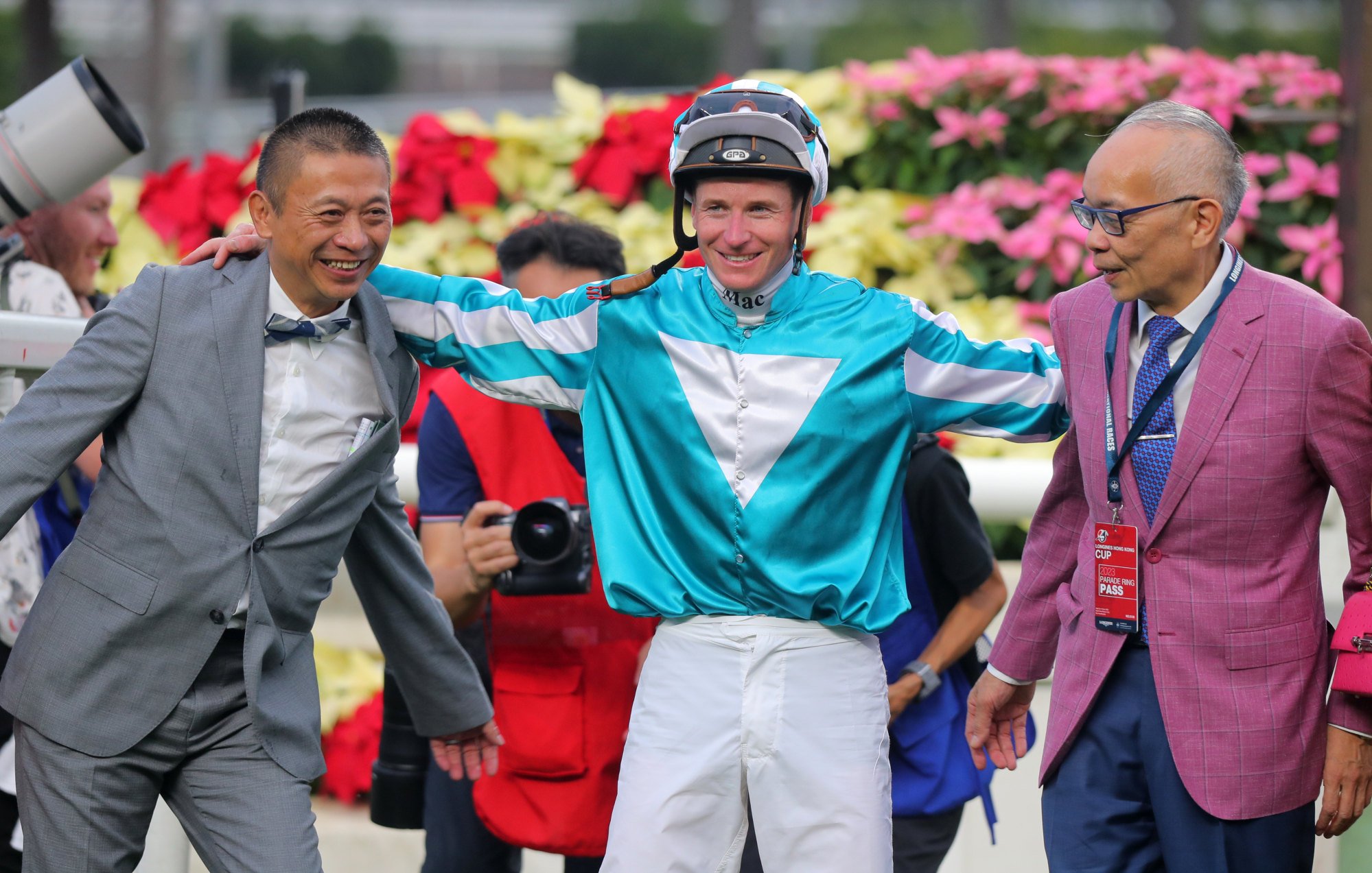 Danny Shum (left), James McDonald and Peter Lau celebrate Romantic Warrior’s win in December’s Hong Kong Cup.