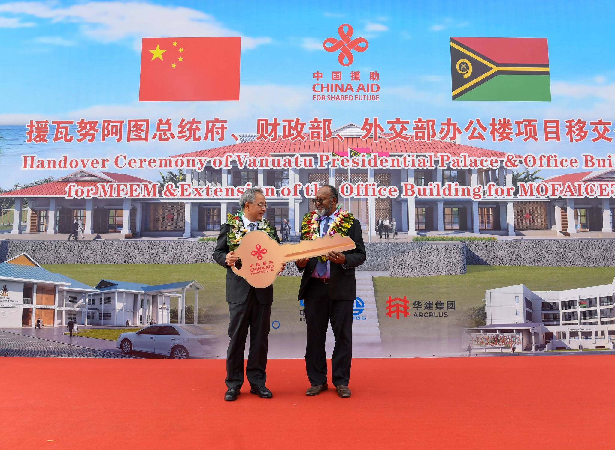 Vanuatu Prime Minister Charlot Salwai receives an oversized novelty golden key to the Pacific nation’s new China-funded presidential palace. Photo: Handout