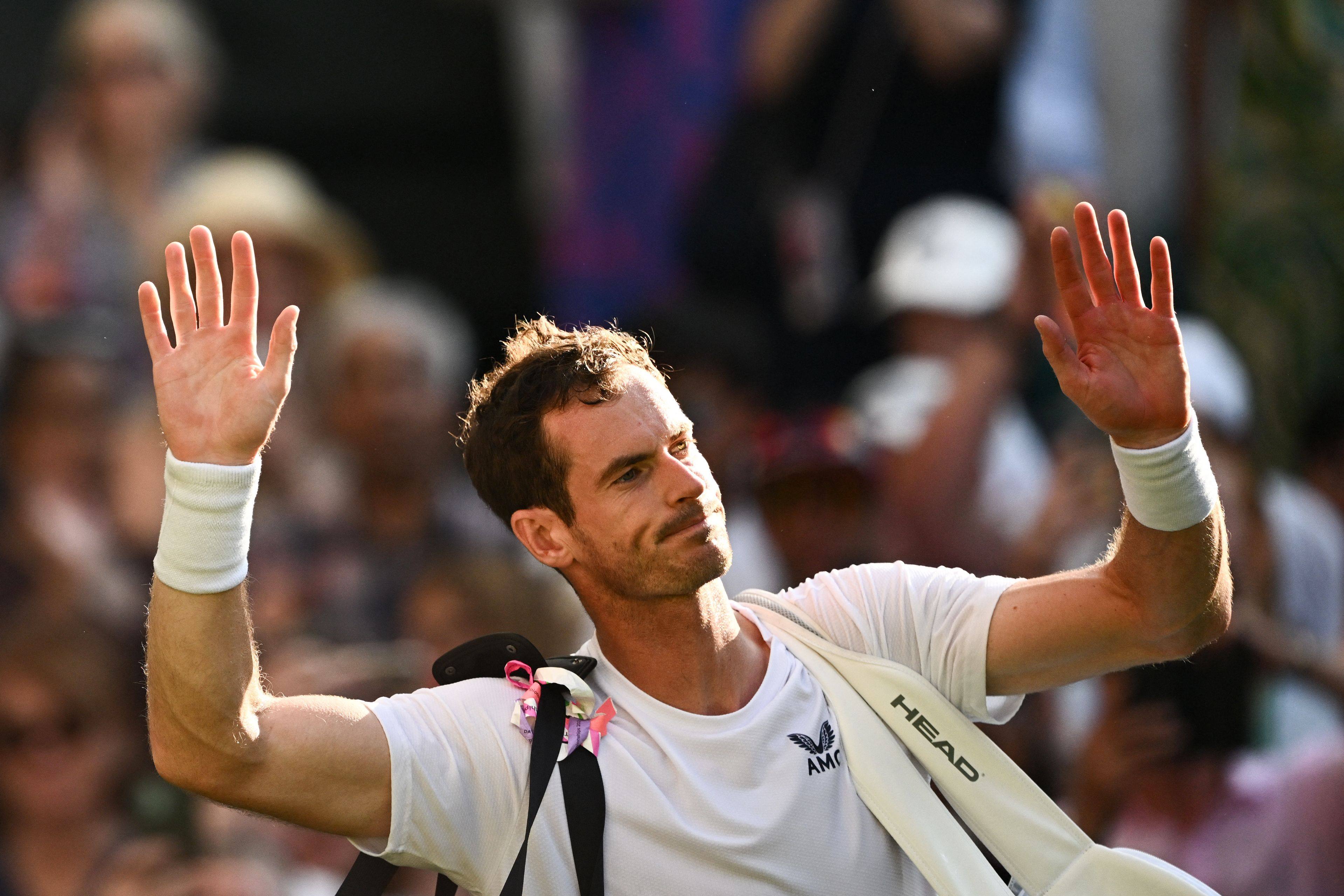 Andy Murray leaves Centre Court following his defeat by Stefanos Tsitsipas during last year’s Wimbledon. Photo: AFP