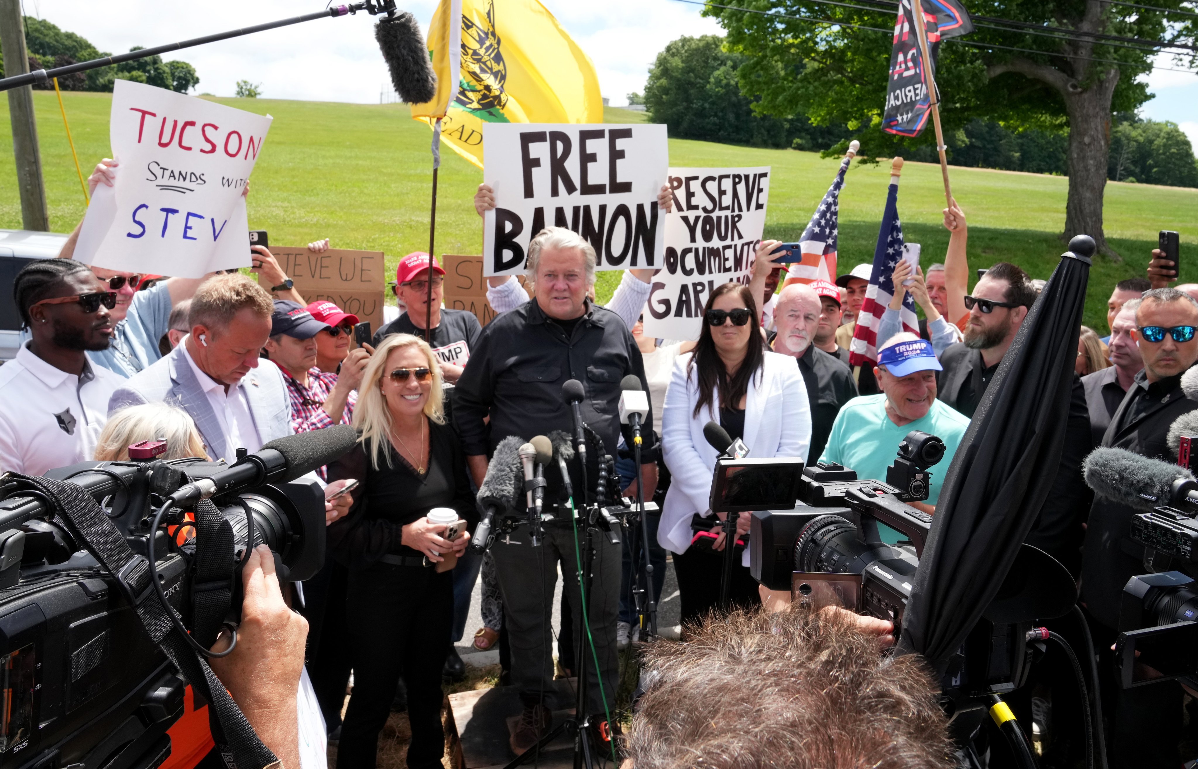 Steve Bannon, centre, speaks to the media as he reports to prison in Danbury, Connecticut, US on Monday. Photo: EPA-EFE