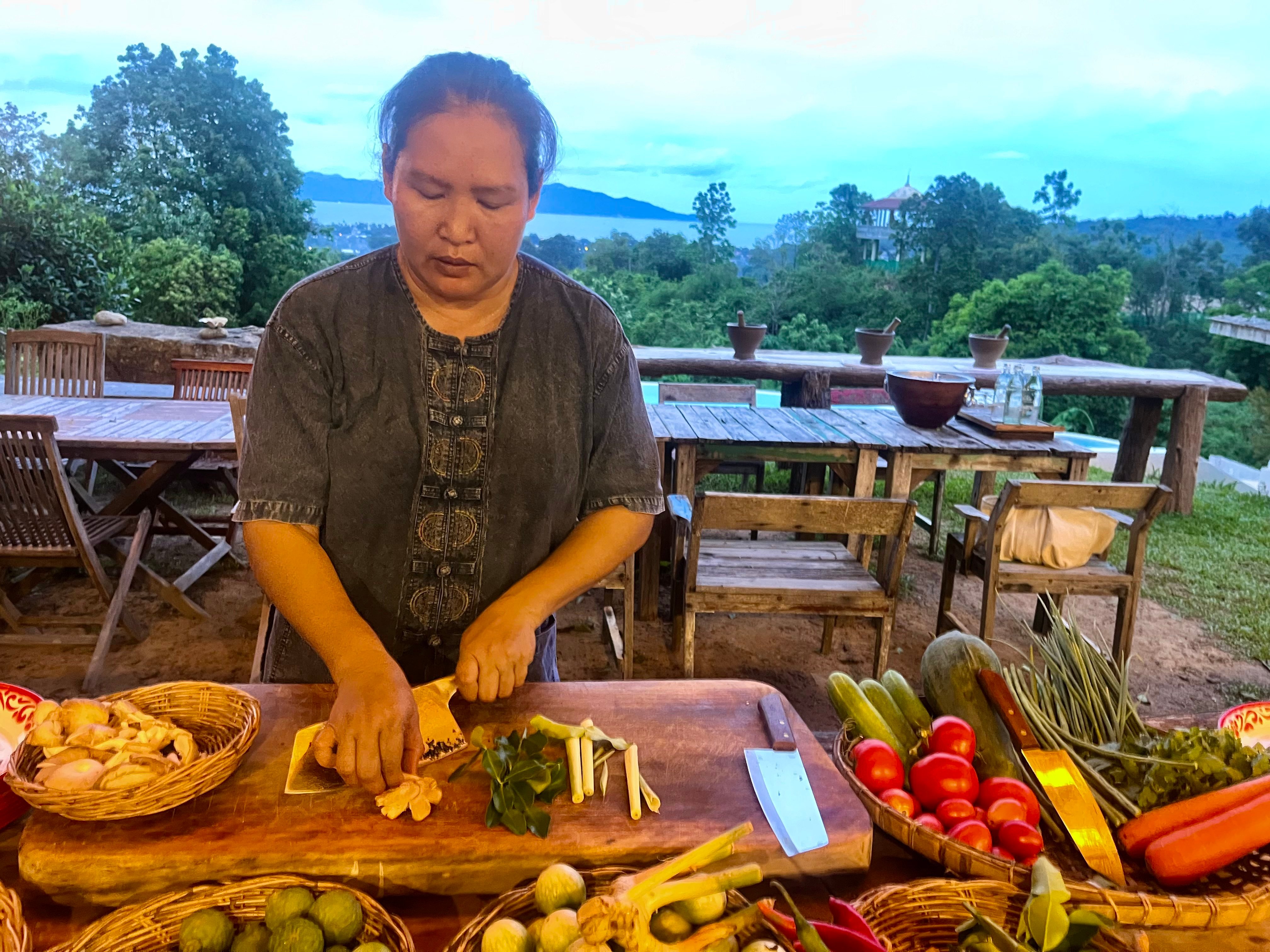 Lin Rattana chops ingredients at her Jungle Kitchen cooking school in Koh Samui, Thailand. Photo: Kylie Knott