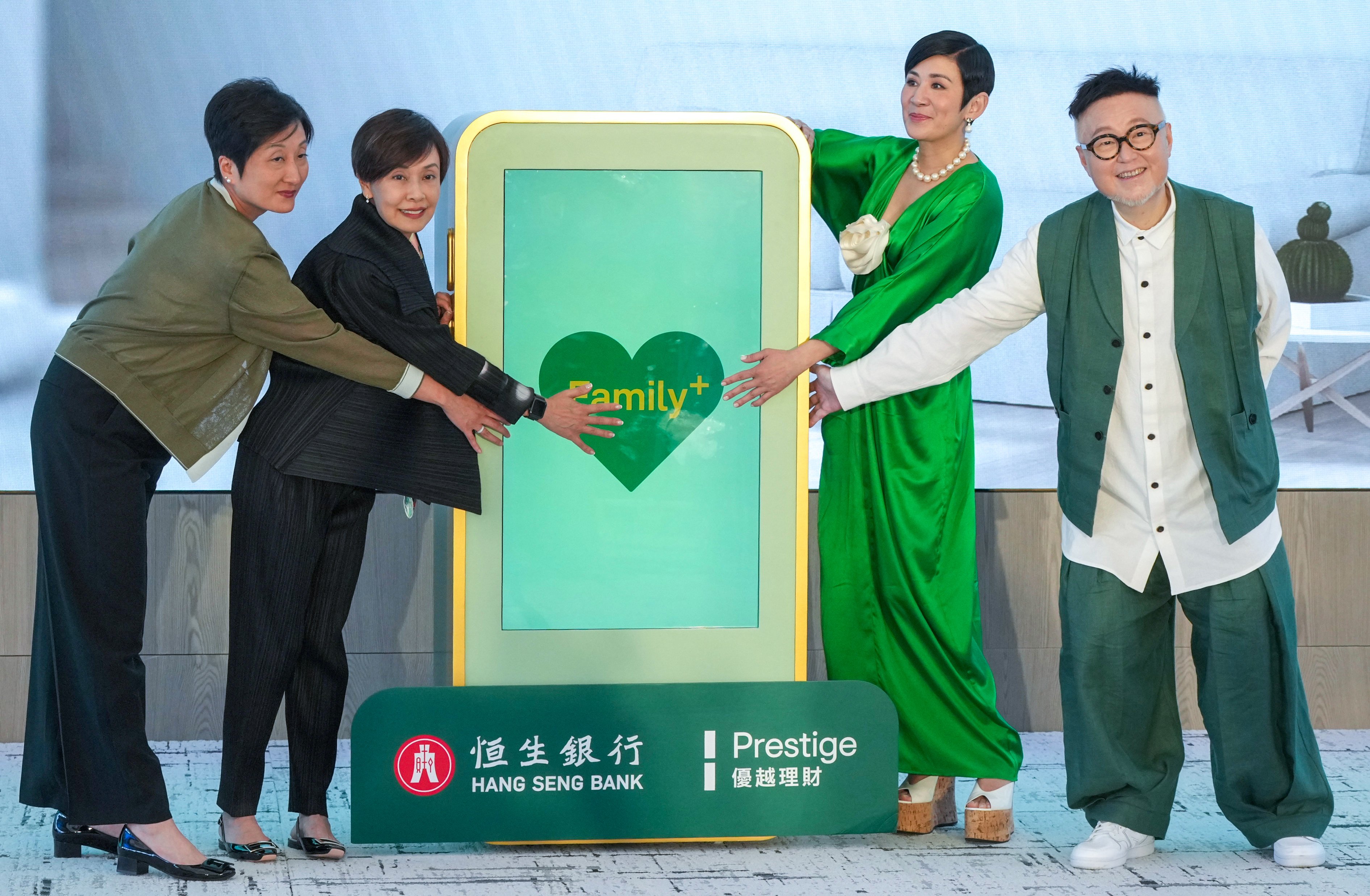 (From left) Hang Seng Bank’s head of wealth management and personal banking Rannie Lee and CEO Diana Cesar are joined by actress Sandra Ng and director Vincent Kok at the launch of the Prestige banking services in Hong Kong on Wednesday. Photo: May Tse