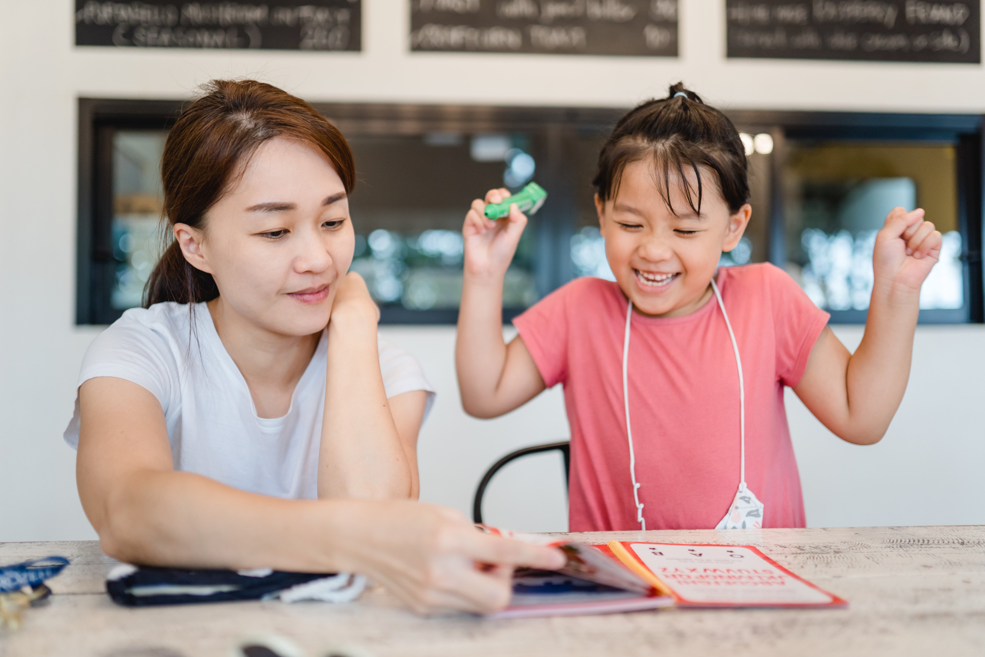 Reading to your child in all the languages they’re exposed to at home is a great way to reinforce their learning. Photo: Shutterstock