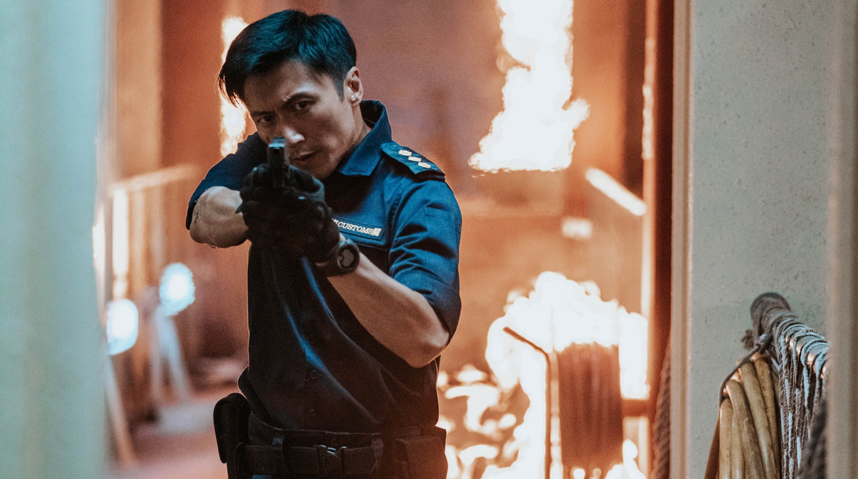 Nicholas Tse as a Hong Kong customs officer in a still from Customs Frontline (category IIB; Cantonese), directed by Herman Yau. Jacky Cheung and Karena Lam co-star.