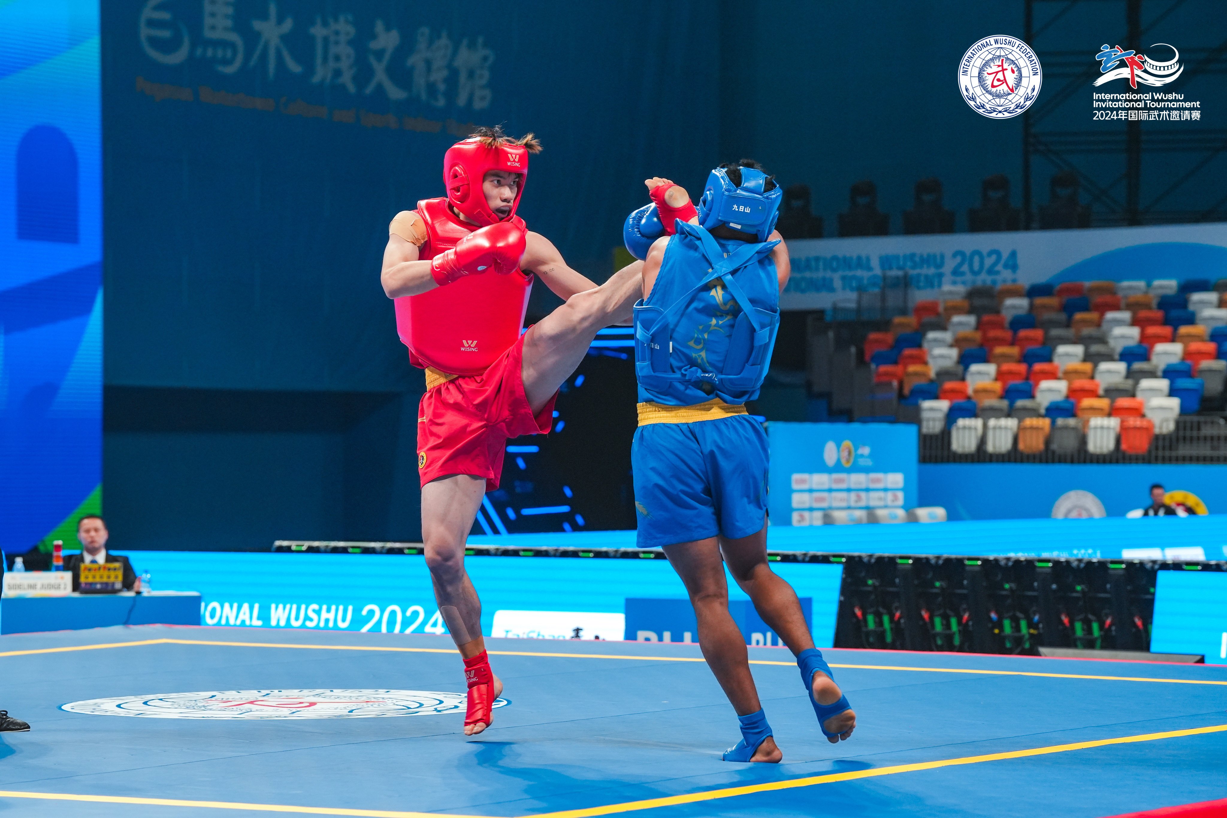 Hong Kong sanda champion Sunny Cheung (left) competes in the 2024 International Wushu Invitational Tournament. Photo: International Wushu Invitational Tournament