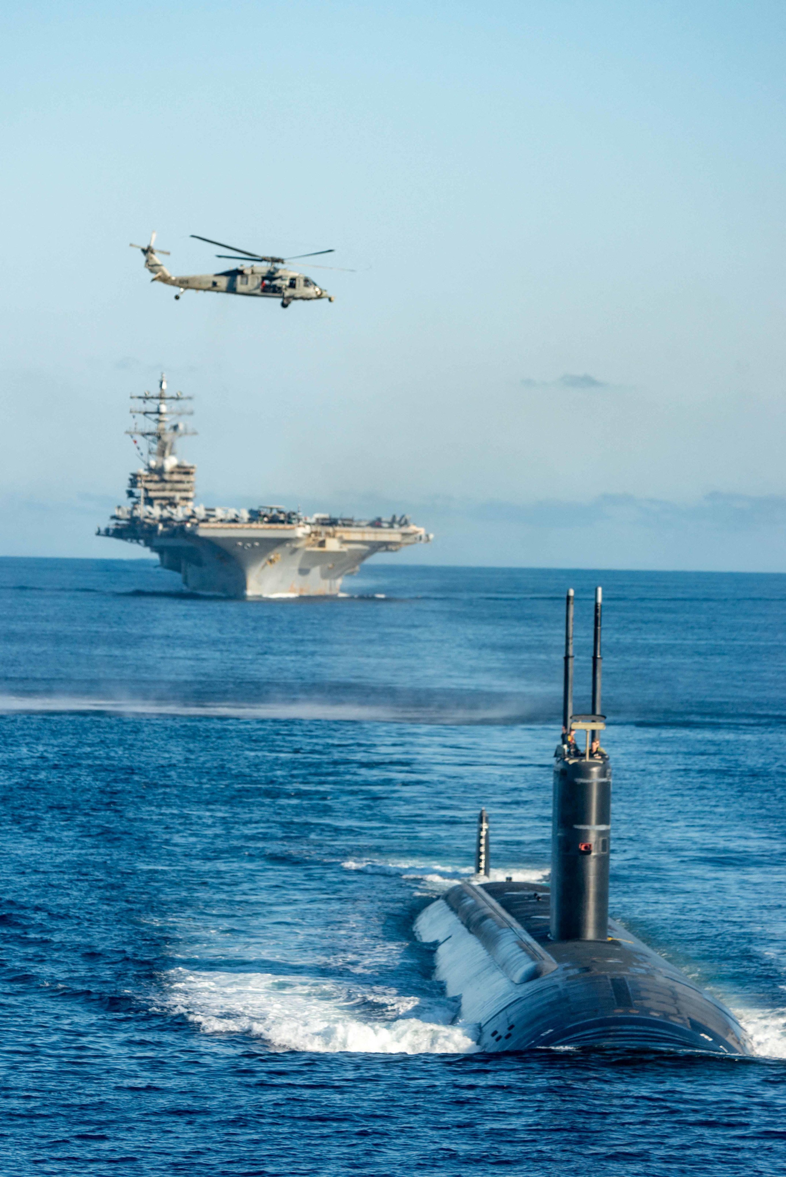 The nuclear-powered USS Ronald Reagan aircraft carrier and the nuclear-powered USS Annapolis submarine during a South Korea-US-Japan exercise in waters off the Korean peninsula. Photo: AFP