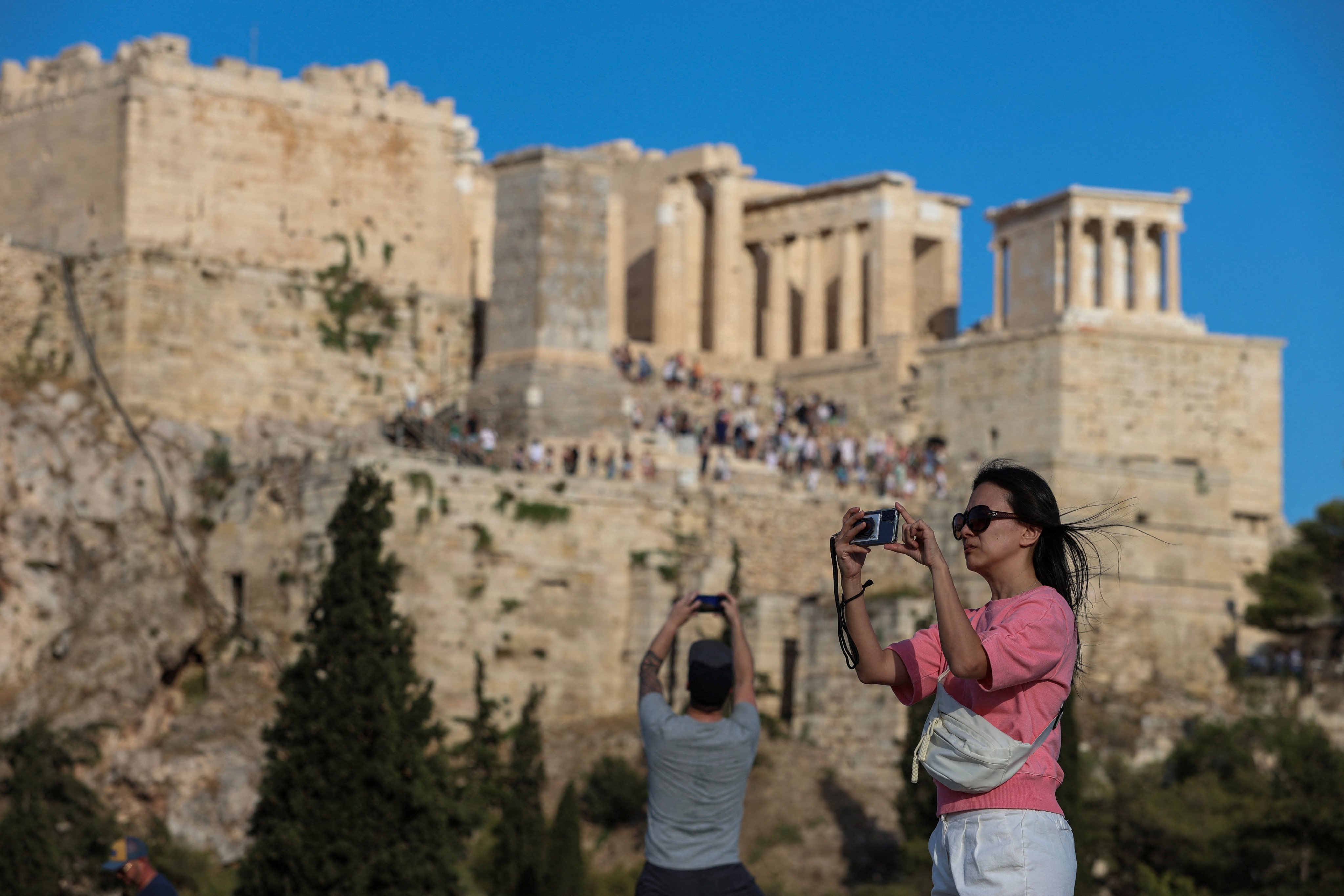 Frustrated by tourists photobombing your Acropolis photos? Greece is now offering tourists private visits – at US$5,400 for up to five people. Meanwhile, helicopter flights to Greek islands have just got cheaper with the launch of airline Hoper. Photo: Reuters