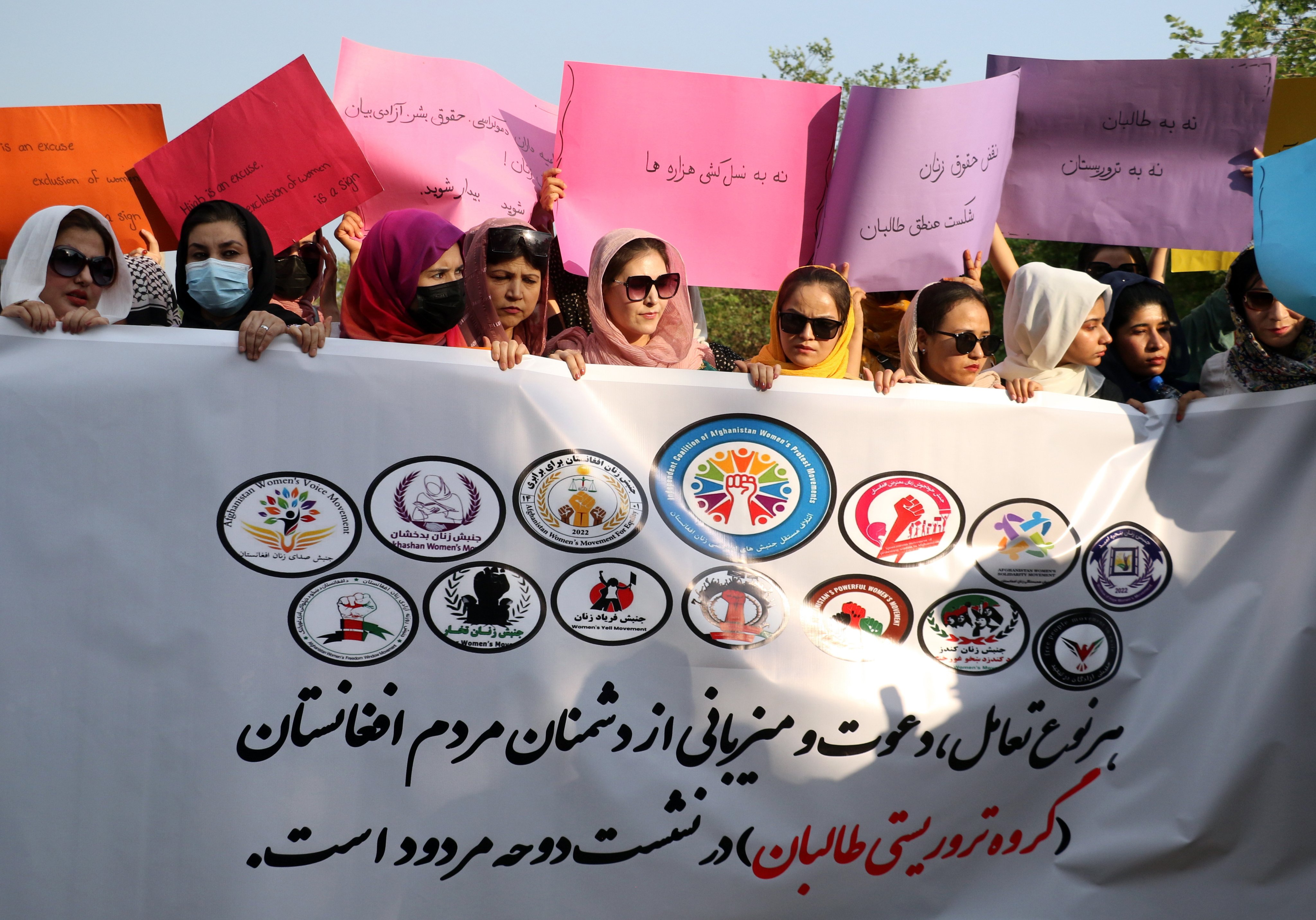 Supporters of the Independent Coalition of Afghan Women’s Protest Movement hold placards during a protest to demand rights of Afghan women from Taliban government in Islamabad, Pakistan, on June 10. Women and civil society groups were barred from the latest UN-backed summit with the Taliban, raising fears that world leaders were ready to abandon their commitment to Afghan women for closer ties with the Taliban. Photo: EPA-EFE