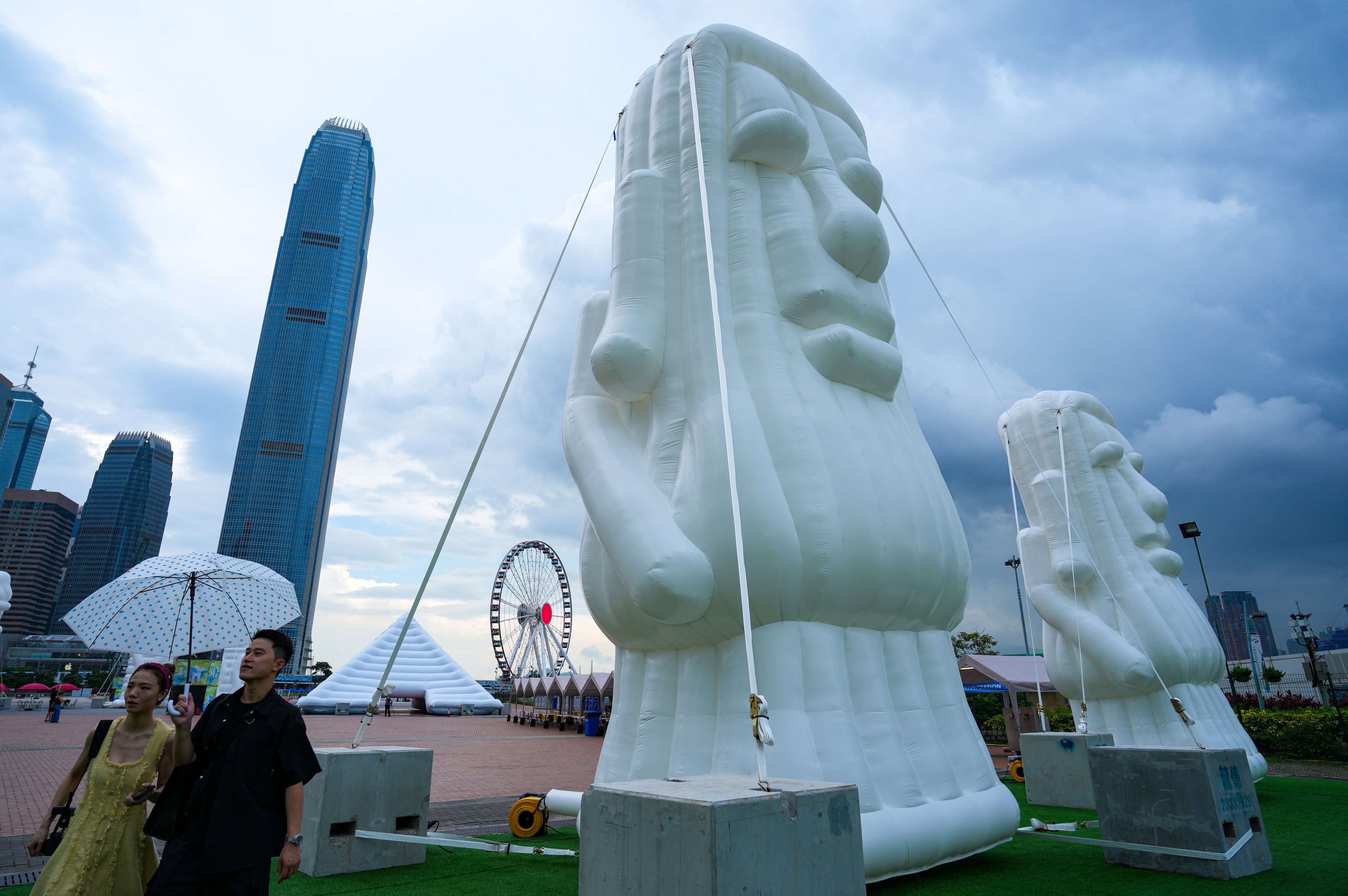 Inflatable replicas of Easter Island’s famous statues loom over Central’s harbourfront as part of the “Inflatable Wonders” exhibition. Photo: Sam Tsang