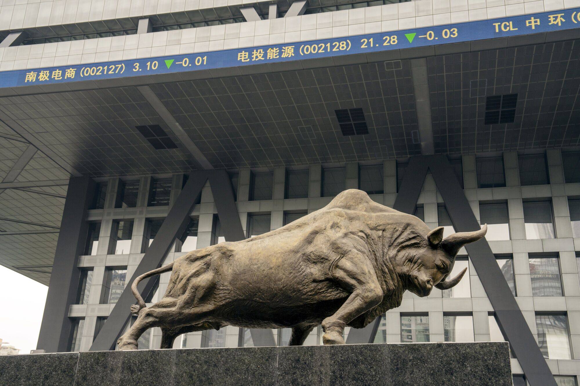 A bull statue in front of the Shenzhen Stock Exchange. Regulators have been strengthening their efforts to lift the market’s performance in recent months. Photo: Bloomberg