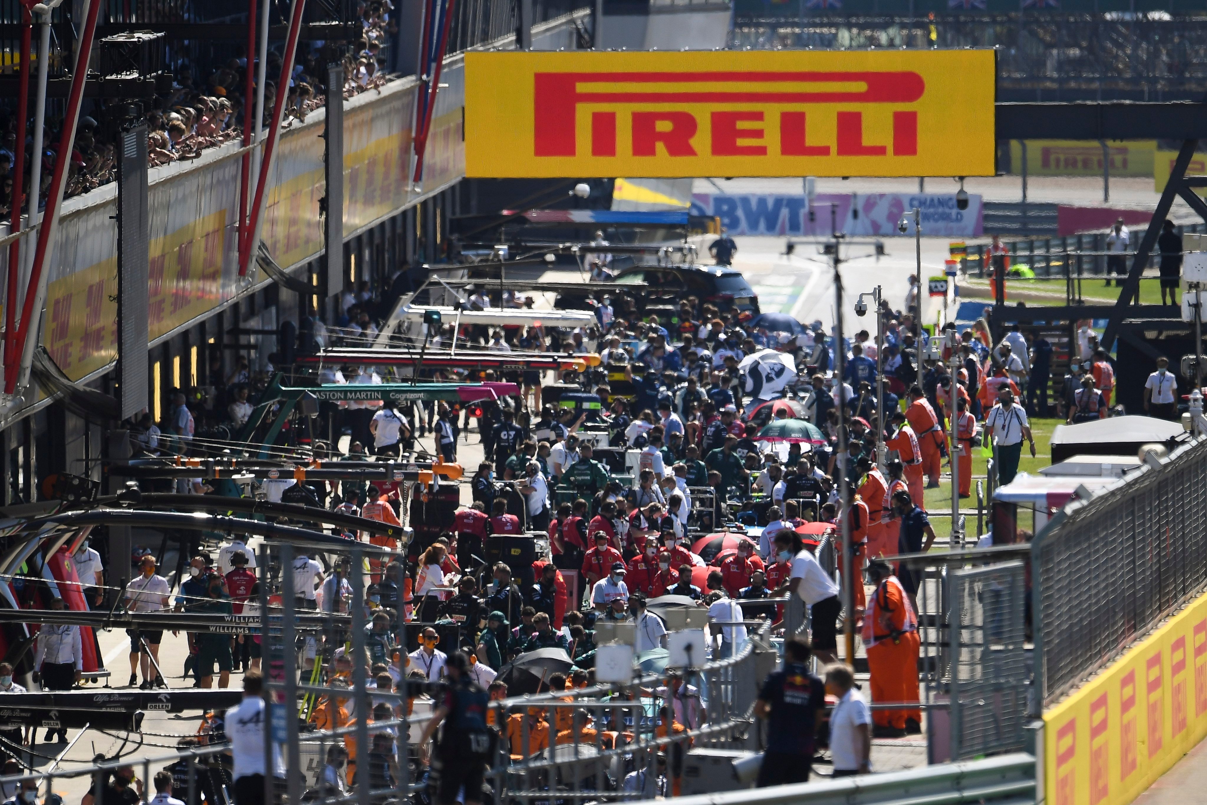 Cars line up in the pit lane after a crash during the British Grand Prix at the Silverstone circuit in 2021. Photo: EPA-EFE