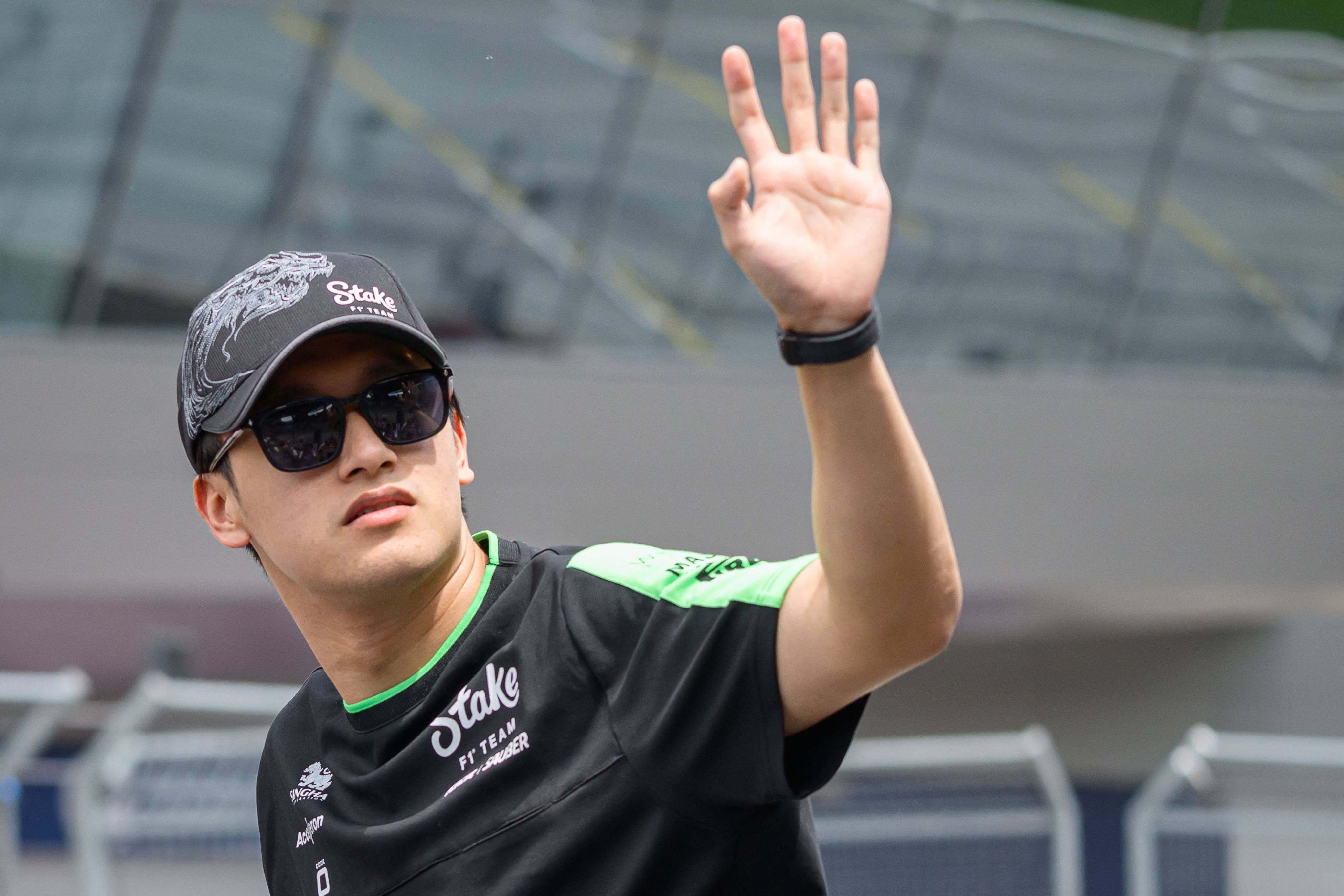 Sauber’s Chinese driver Zhou Guanyu, seen here at the Drivers Parade of this weekend’s Austrian Grand Prix, faces an uncertain future in Formula One. Photo: AFP