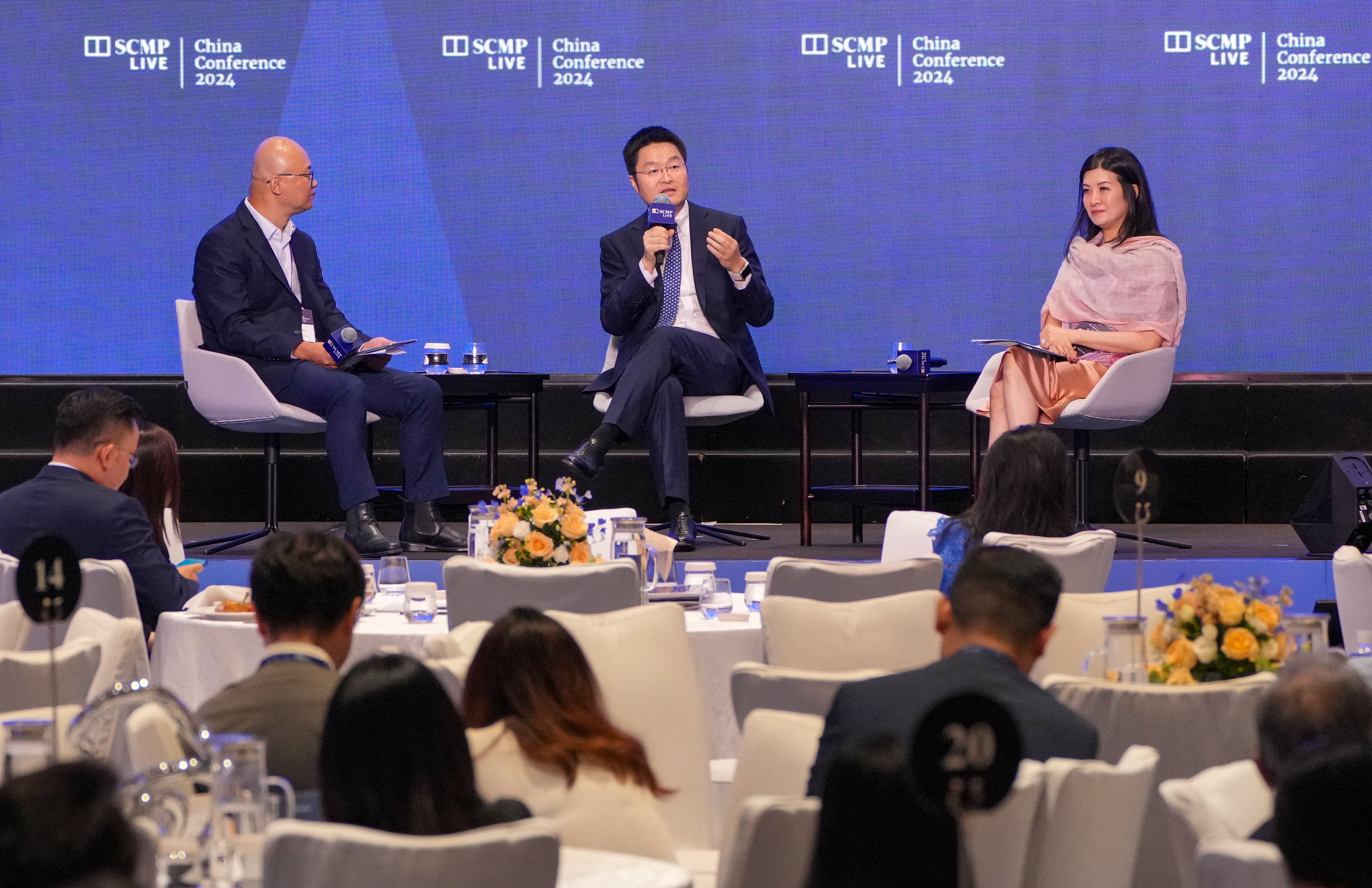 Henry He (centre), executive director and chief financial officer at Kingsoft Cloud, and Maryann Tseng (right), senior managing director of strategic investment at SenseTime, speak in a panel at the China Conference on Thursday. Photo: May Tse