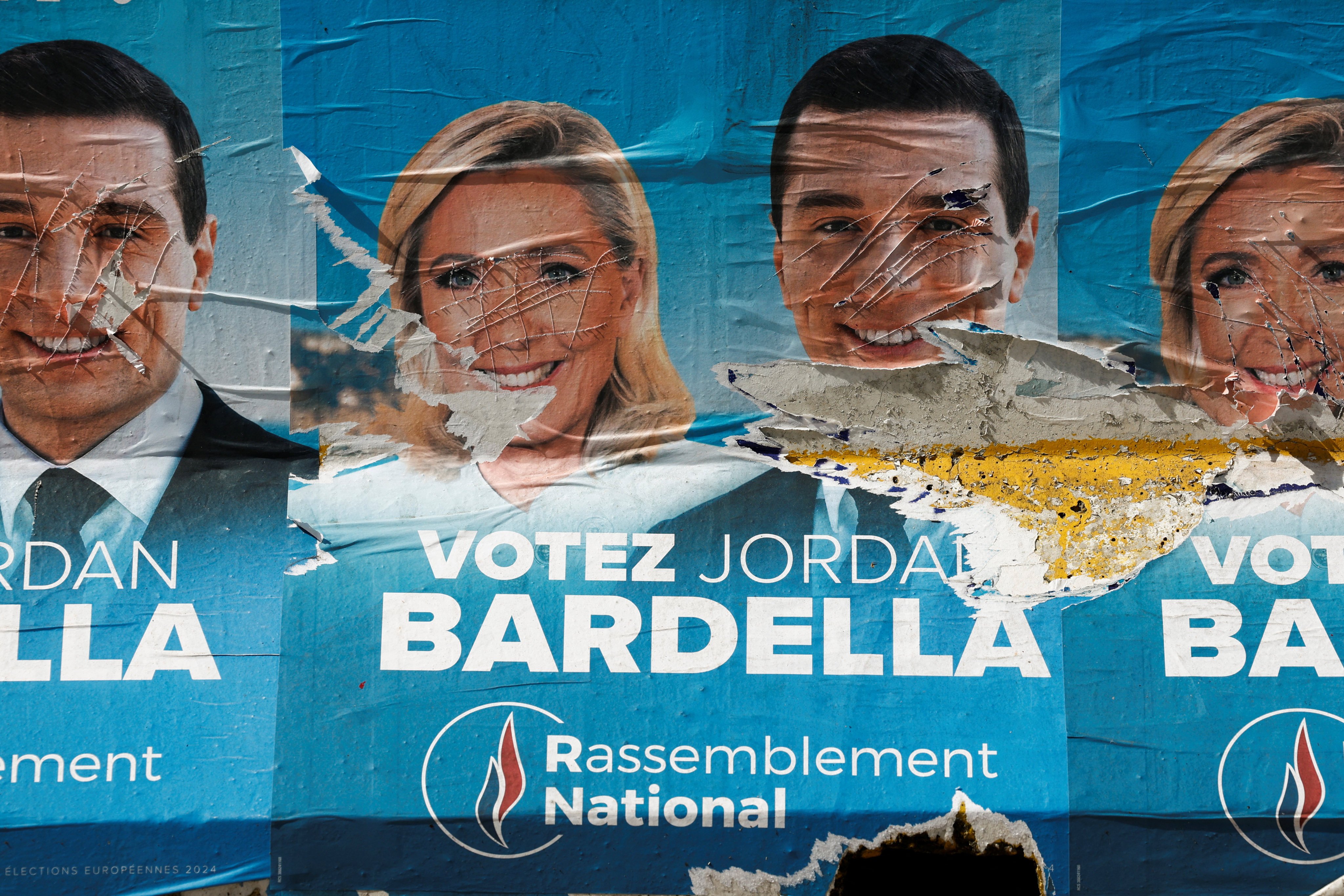 Election posters for the French far-right National Rally party with pictures of leaders Marine Le Pen and Jordan Bardella are seen near the party’s headquarters on Friday before the second round of parliamentary elections this weekend. Photo: Reuters