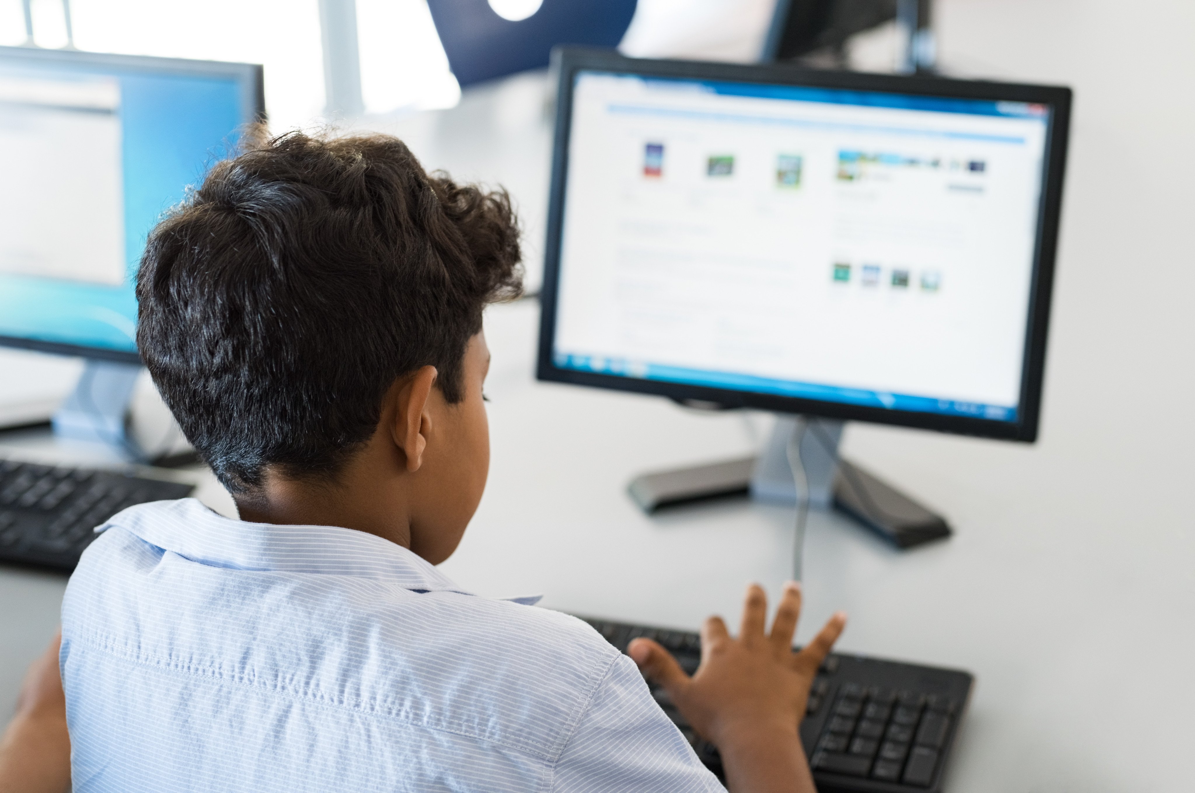 Children in New Zealand spend a lot of time staring at their screens. Photo: Shutterstock 