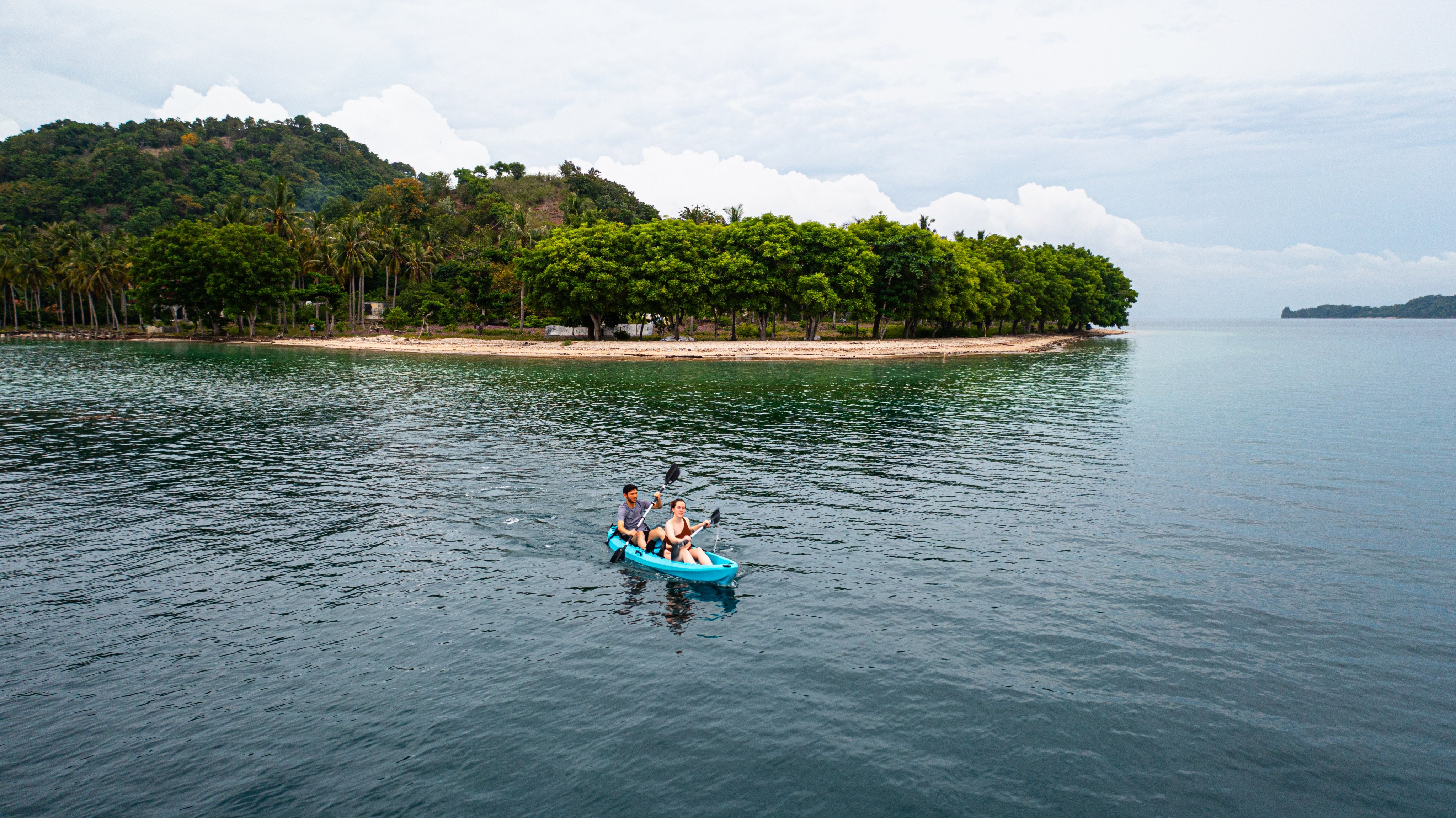 A couple kayaks around Gili Asahan, off Lombok, Indonesia. Photo: Josh Edwards