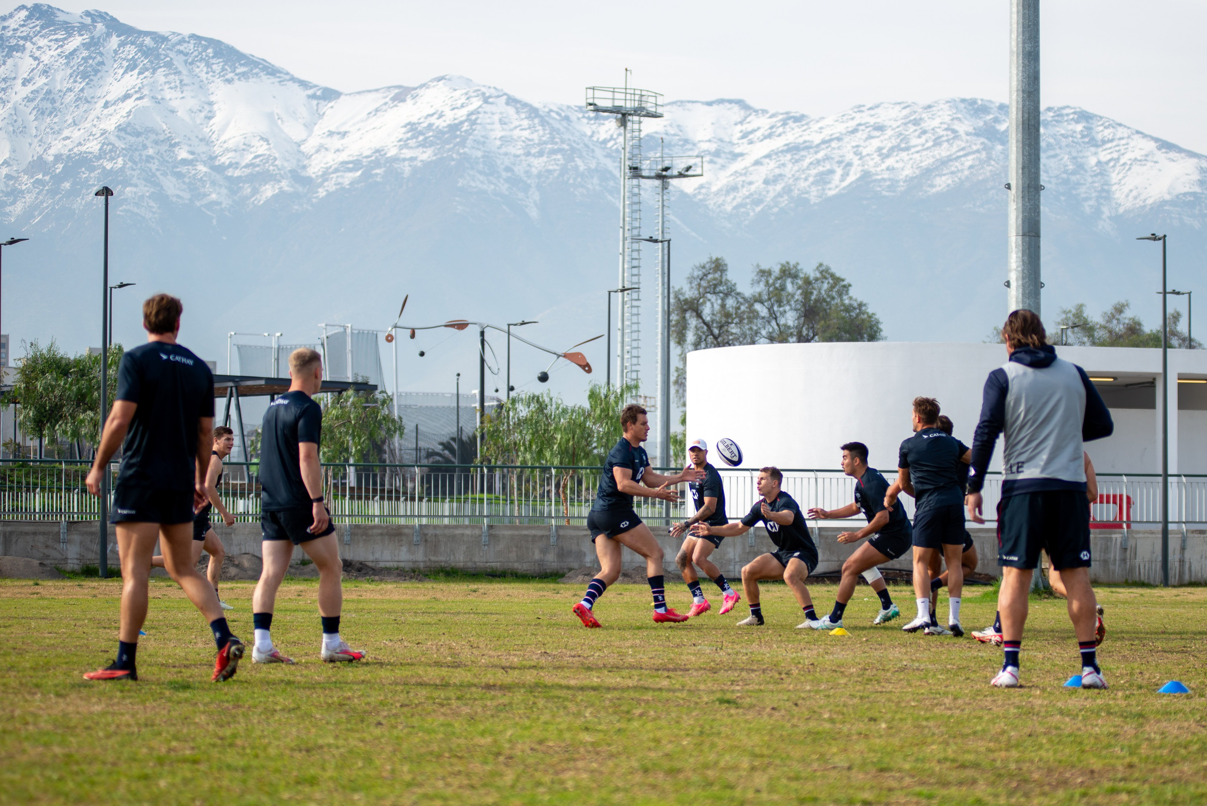 Hong Kong’s Tommy Hill (centre) passes the ball during a training session in Talca, Chile. Photo: Carlos Lorca/Chile Rugby