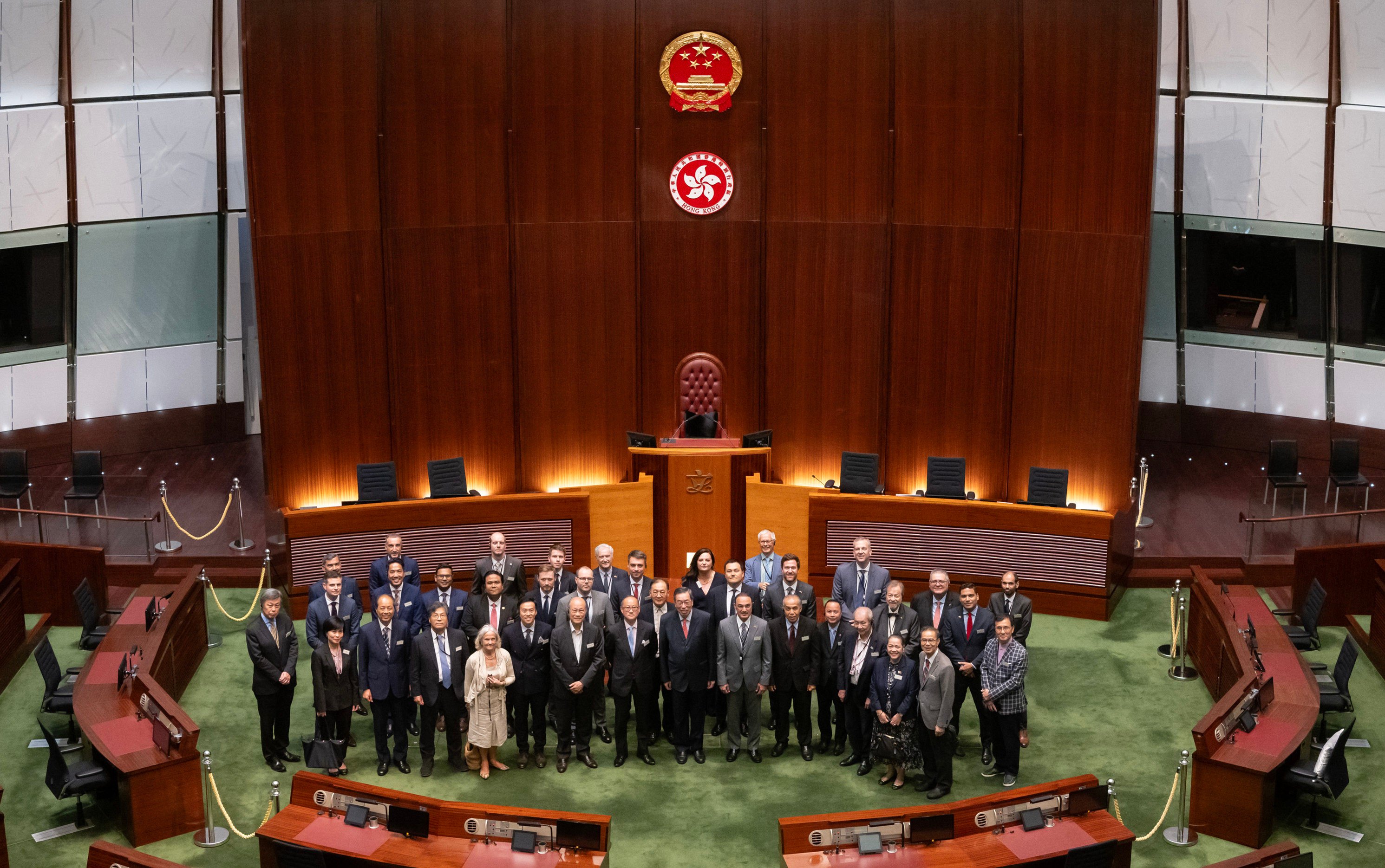 Legco president Andrew Leung (front row, centre) joins foreign diplomats for a group photo in the chamber. Photo: Legco