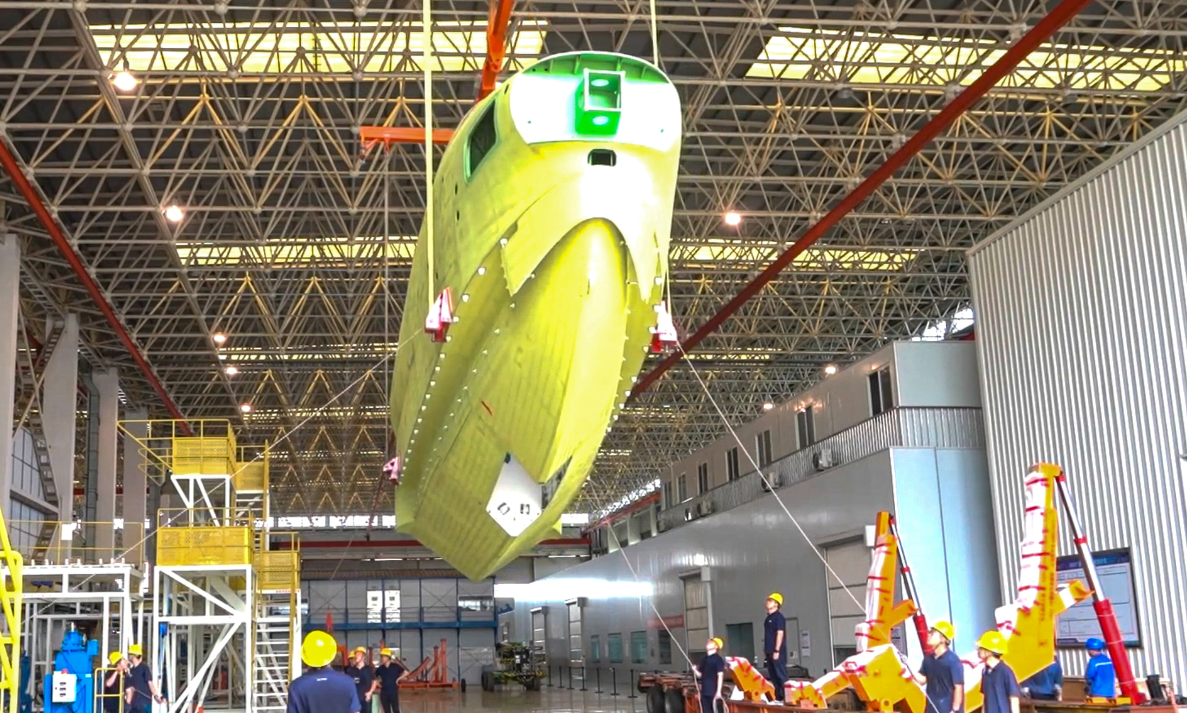 The front assembly for the first batch-produced AG600 aircraft was delivered on June 30. Photo: CCTV