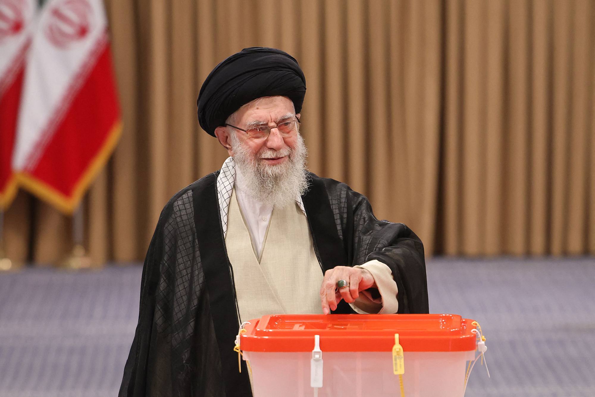 Iranians Vote In Run-off Presidential Race Between Hardliner And ...