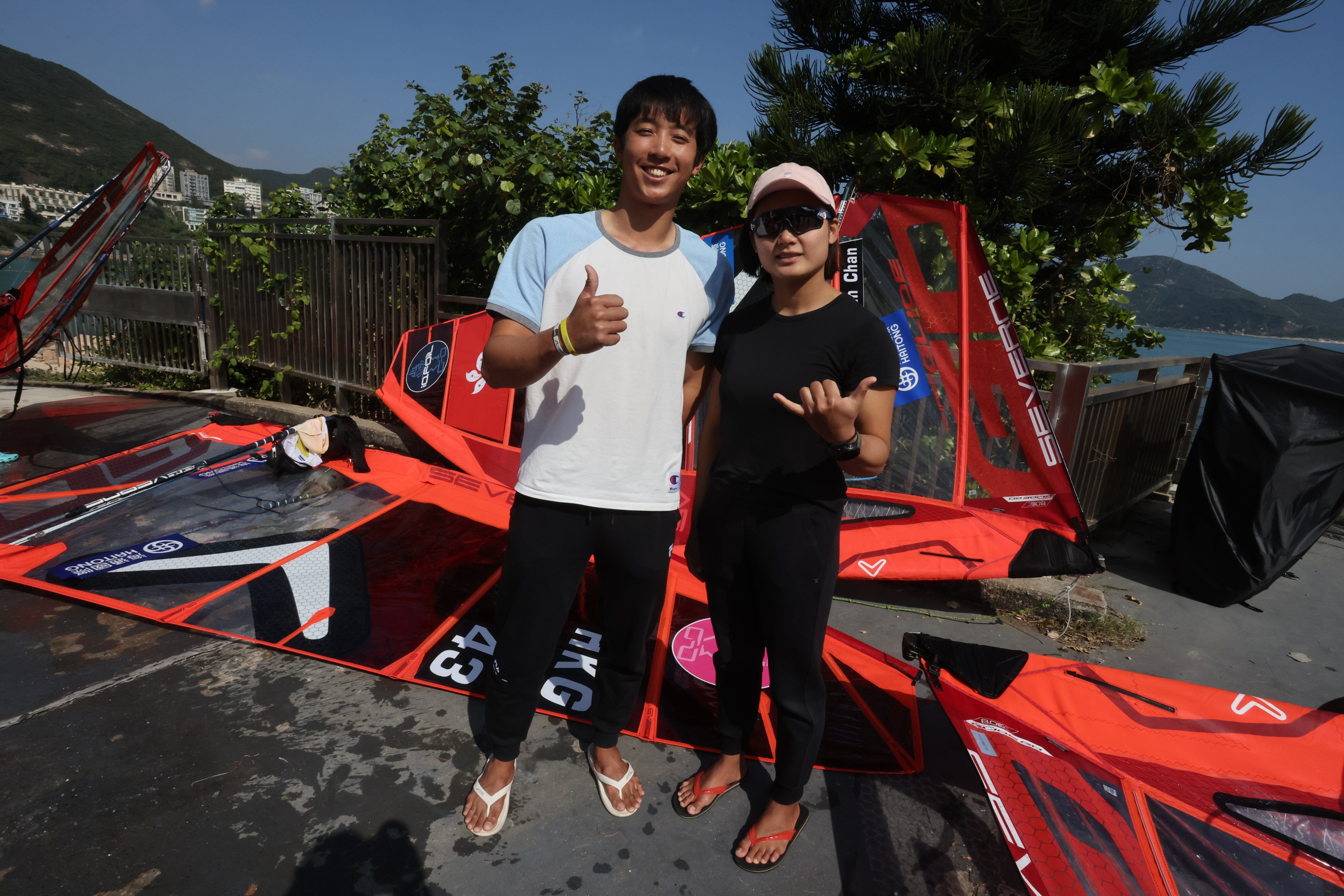 Hong Kong windsurfers Cheng Ching-yin (left) and Ma Kwan-ching are used to travelling together. Photo: Jonathan Wong