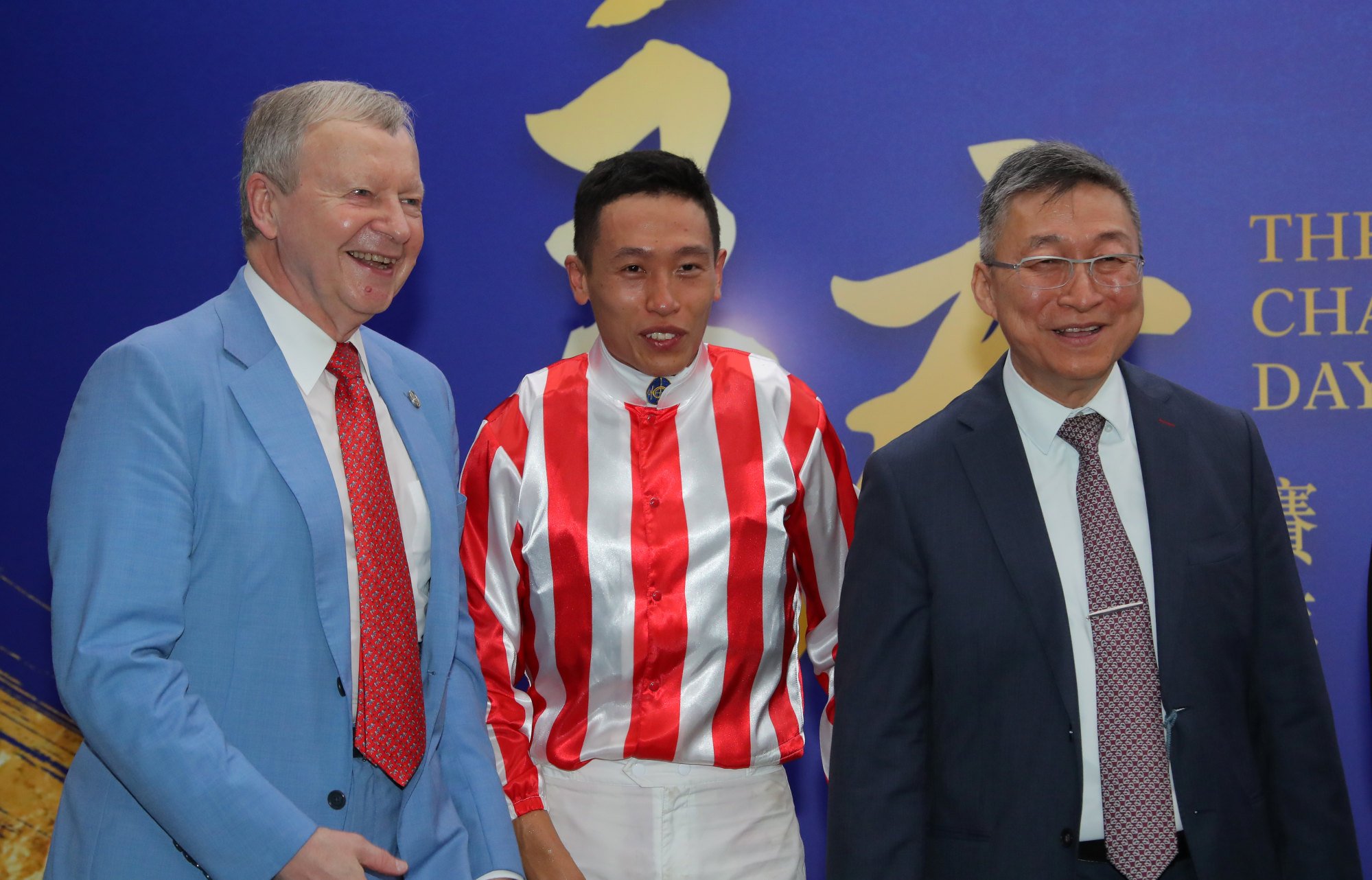 Francis Lui (right), Vincent Ho (centre) and Jockey Club CEO Winfried Engelbrecht-Bresges are all smiles after King Miles’ win.