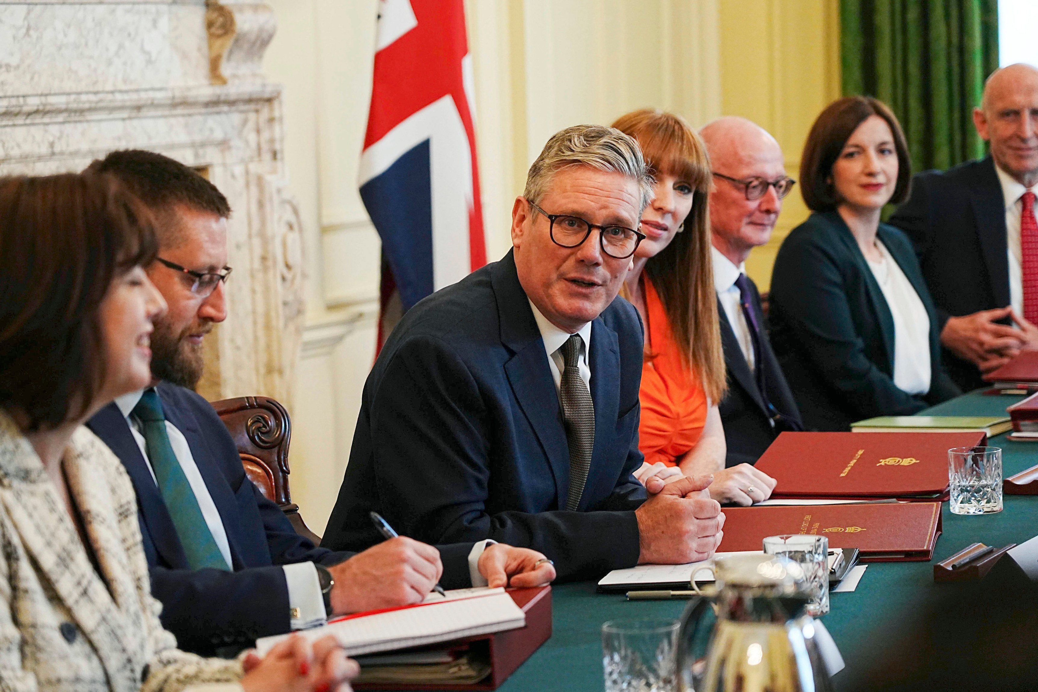 Britain’s Prime Minister Keir Starmer (middle) hosts his first cabinet meeting at 10 Downing Street. Among a raft of problems they face are boosting a sluggish economy, fixing a broken healthcare system, and restoring trust in government. Photo: AP