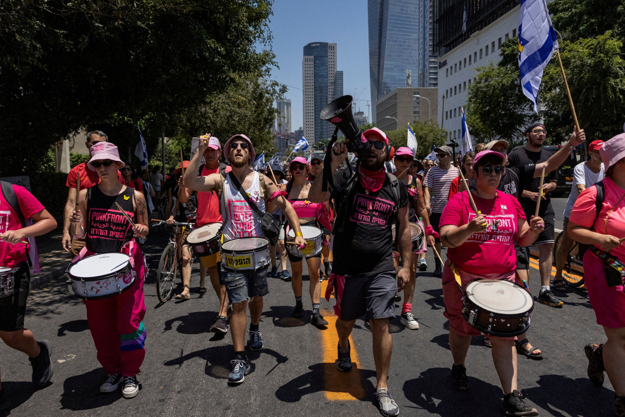 People march to demand the release of hostages held in Gaza, during a day of protests marking nine months since the deadly October 7 attack, in Tel Aviv, Israel, on Sunday. Photo: Reuters