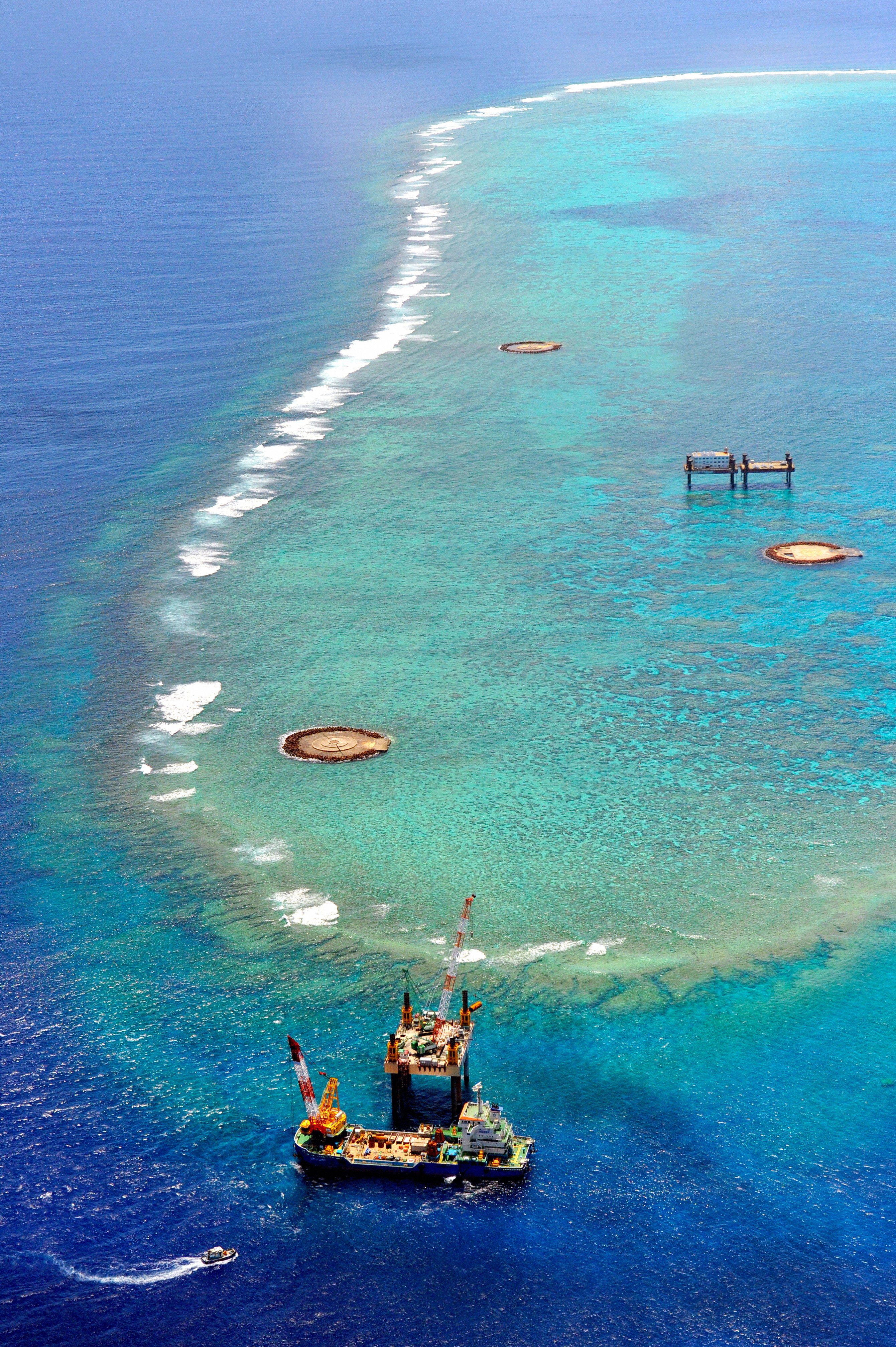 Okinotorishima is largely submerged at high tide, with only two small islets measuring just 9.4 square metres remaining above the water line – and even those were built up with concrete by Japan. Photo: Asahi Shimbun/Getty Images