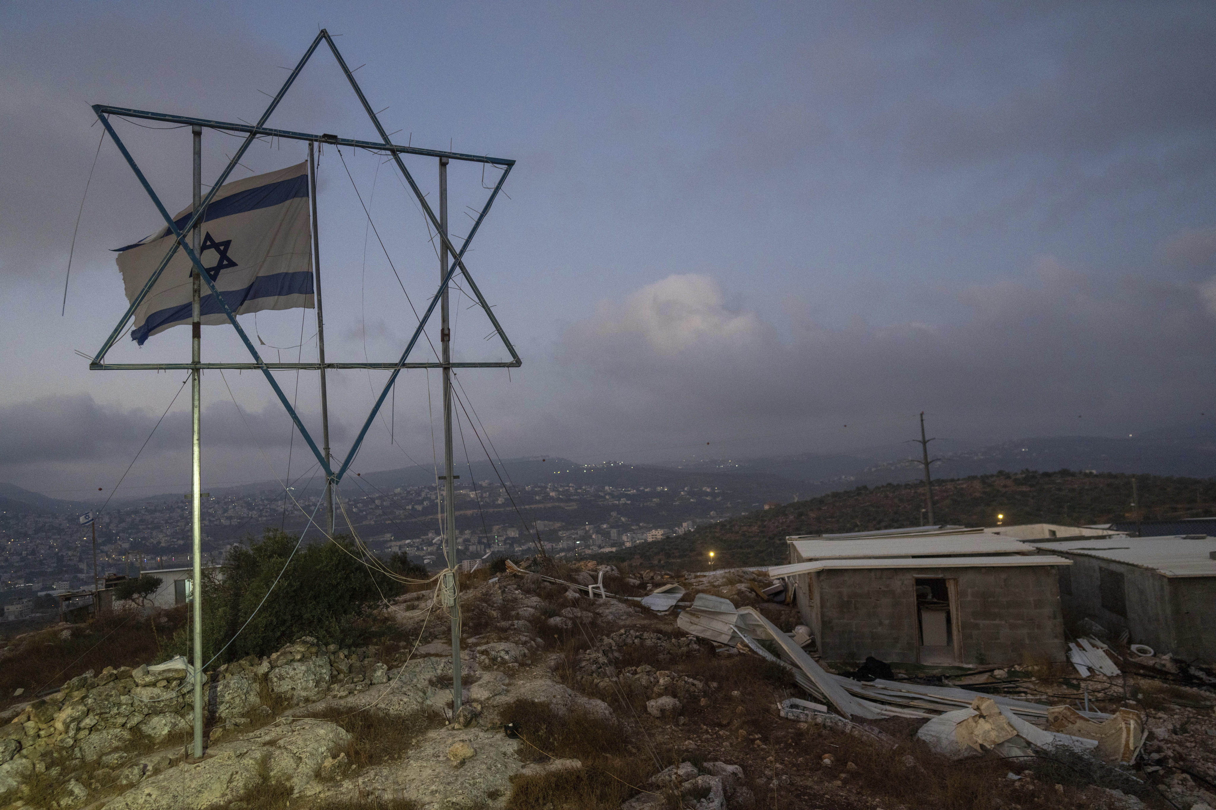 Morning prayers at the Eviatar outpost in the Israeli-occupied West Bank calling for the legalisation of the outpost and the return of the hostages held in Gaza by the Hamas militant group. Photo: AP